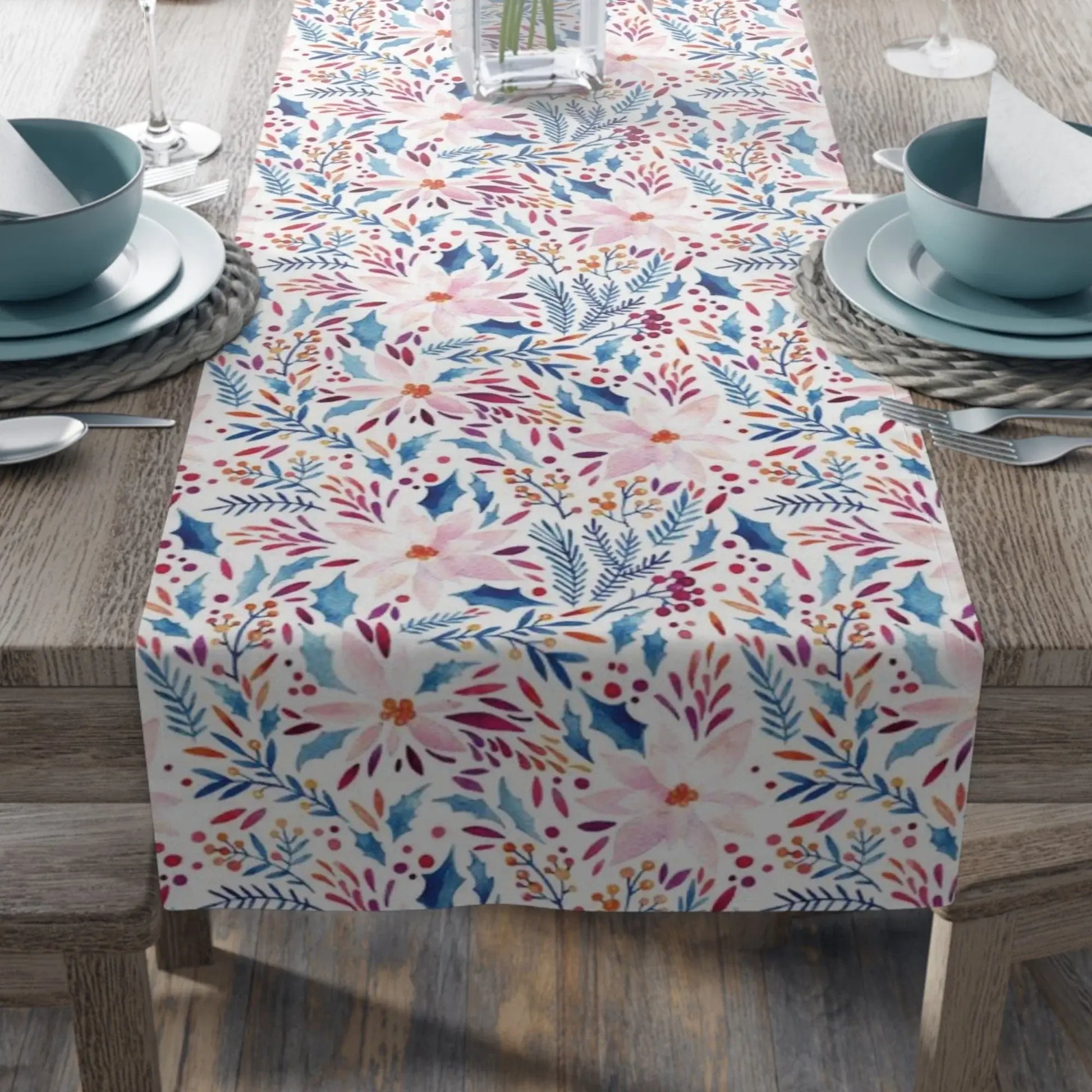 Pink Poinsettia Winter Table Runner displayed on a dining table with elegant dishware.