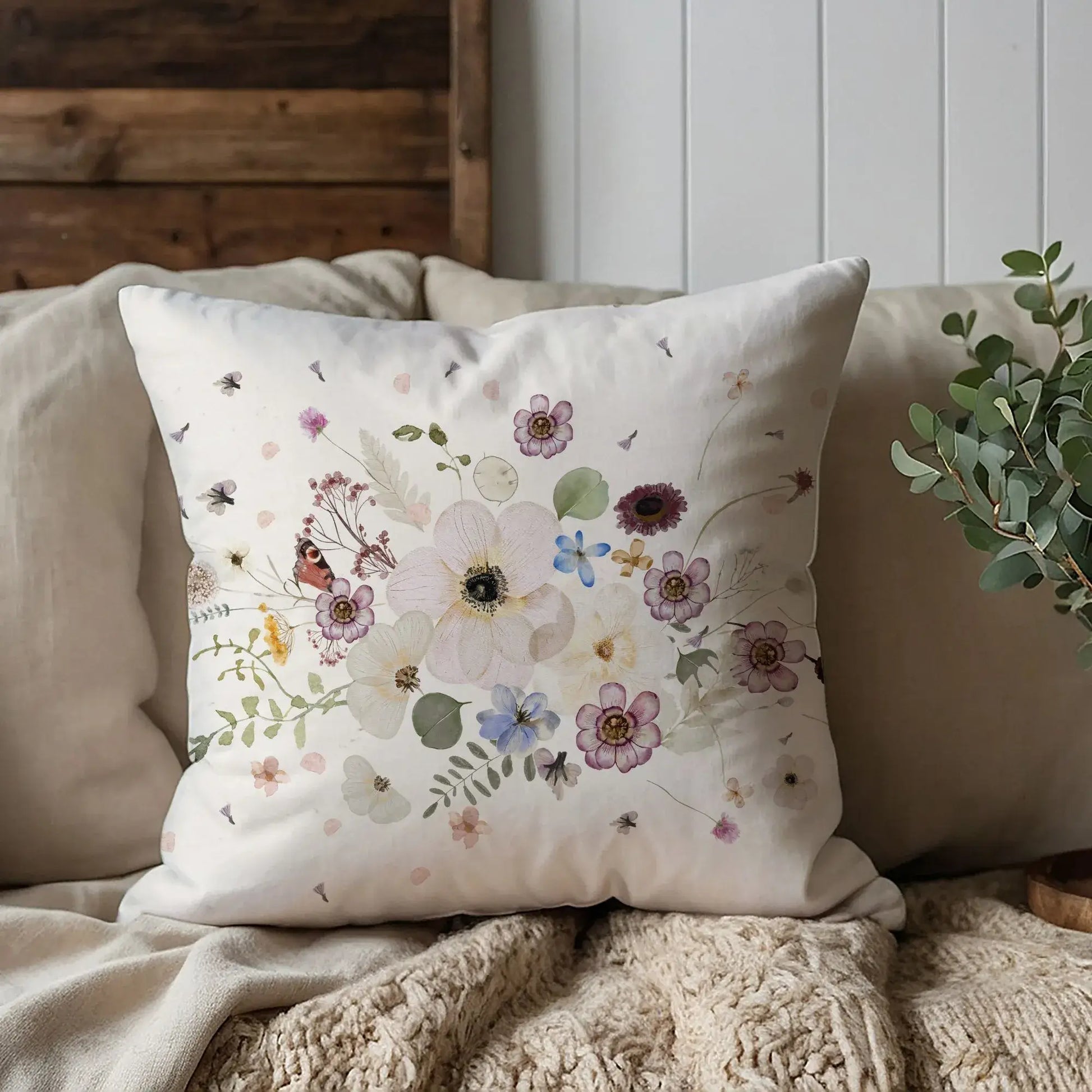 Pressed Flowers spring PILLOW with watercolor floral design on cozy couch decor.
