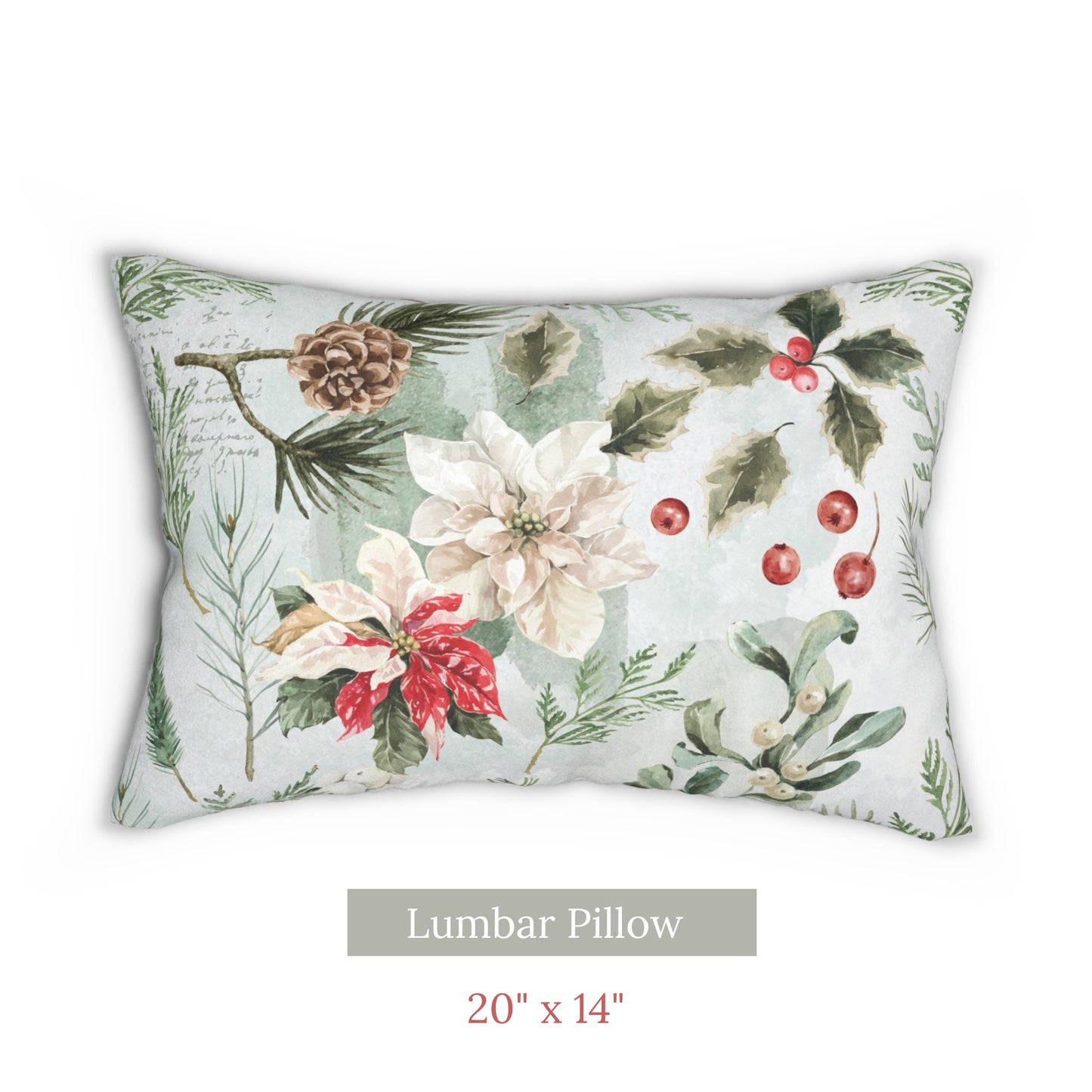 Lumbar Christmas pillow with poinsettia flowers, holly, pinecones, and mistletoe on soft winter background