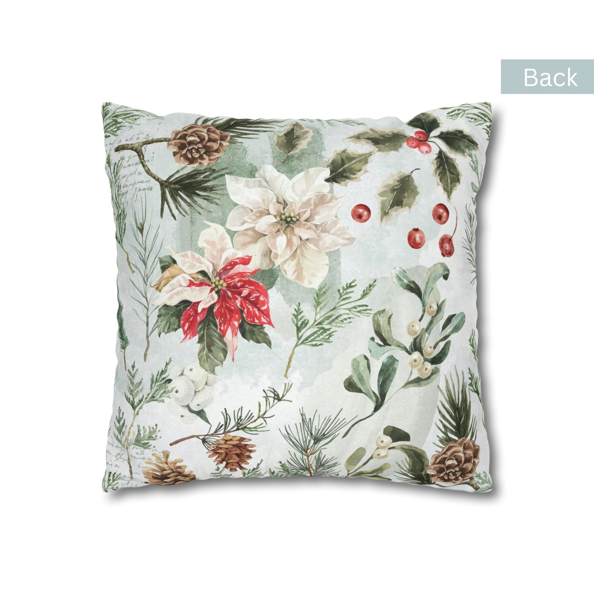 Back view of poinsettia Christmas pillow with white flowers, holly, pinecones, and mistletoe