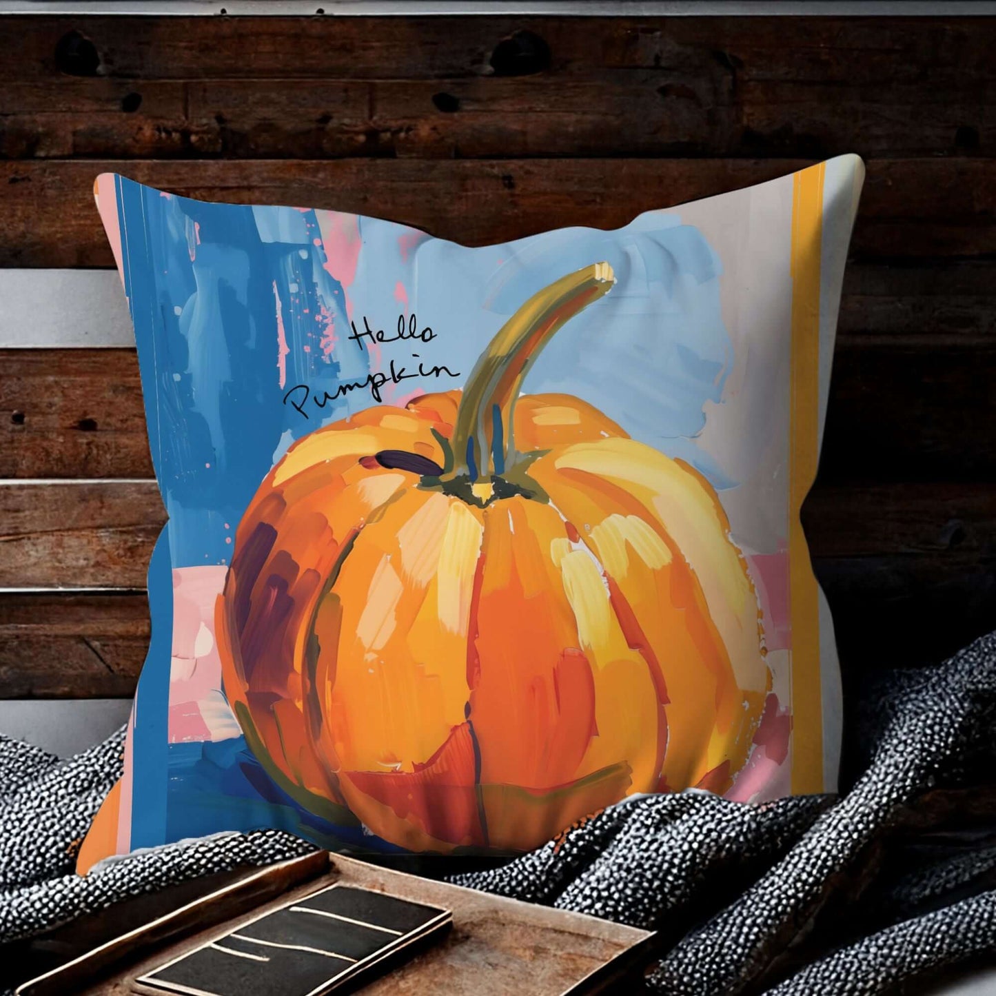 Pumpkin pillow cover fall decor with vibrant watercolor pumpkin illustration on cozy sofa.