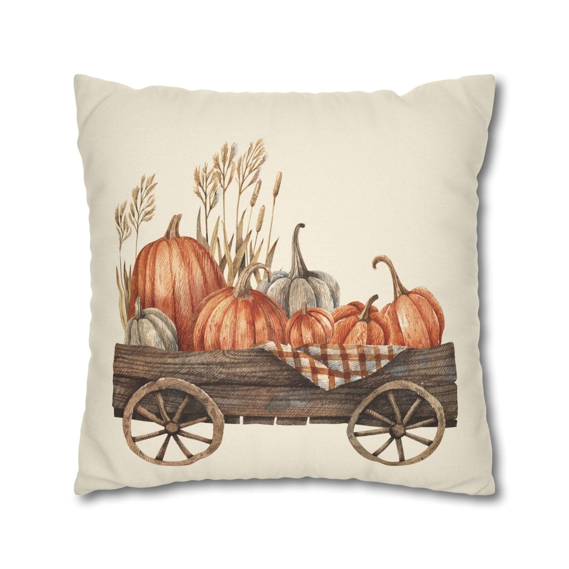 Pumpkin pillow cover featuring a watercolor print of pumpkins in a cart, ideal for farmhouse fall decor.