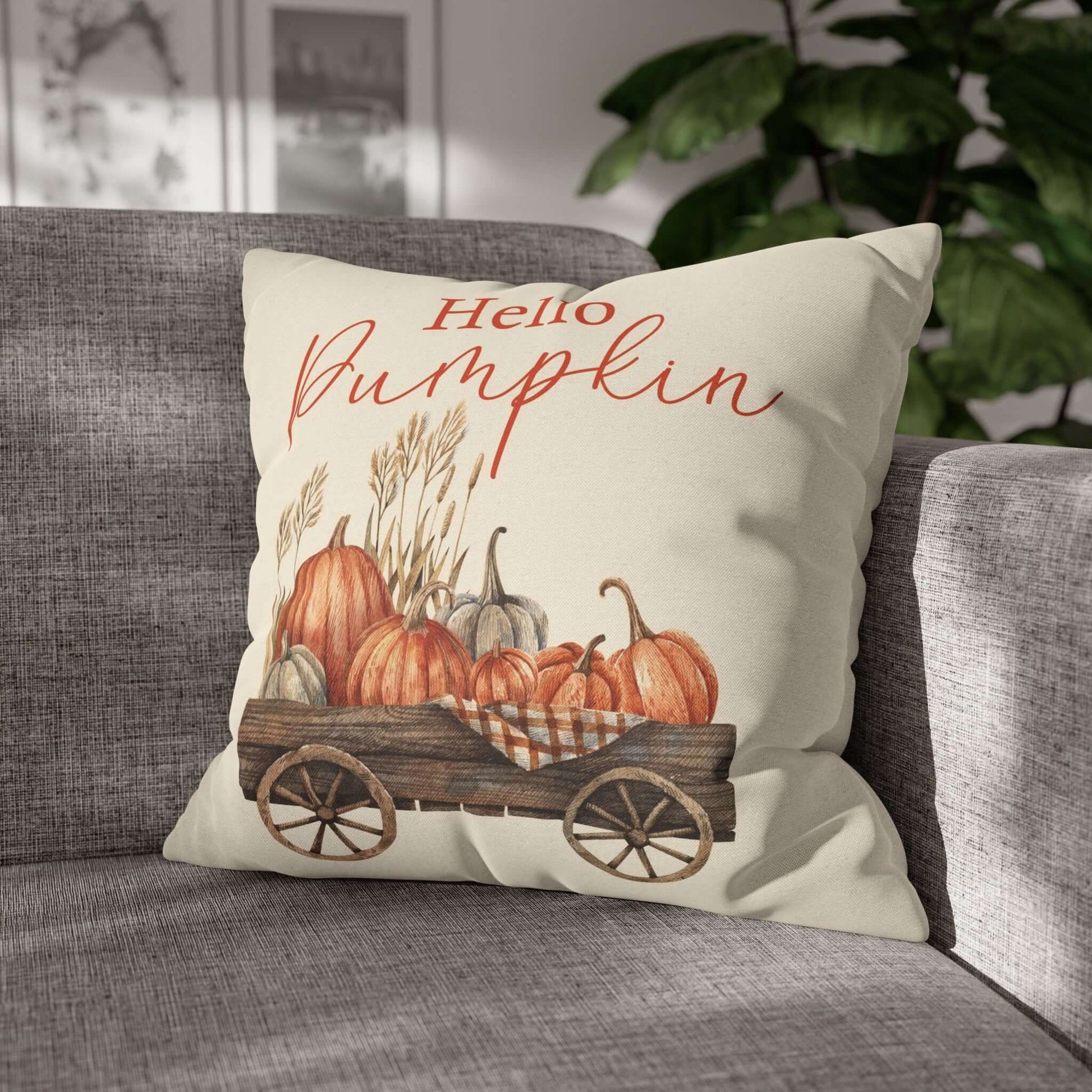 Pumpkin pillow cover featuring a rustic design with pumpkins in a wagon, perfect for cozy fall decor.