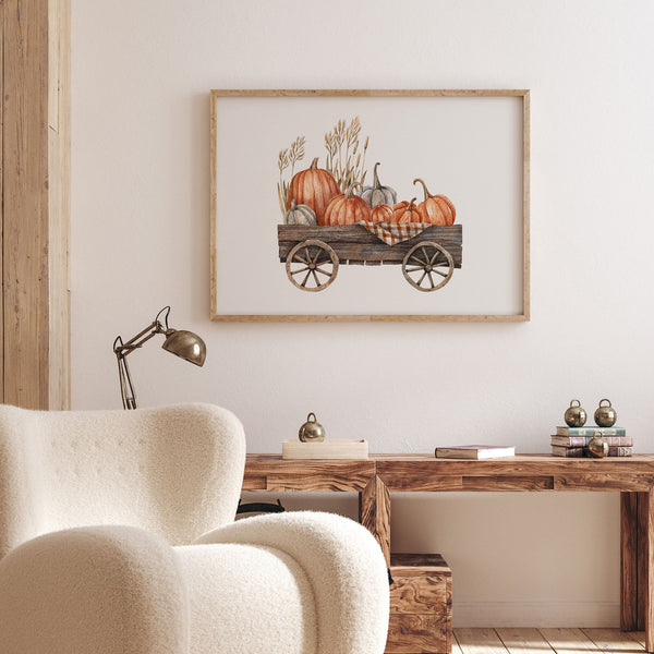 living room with autumn vibe and Pumpkin Cart painting from Blue Water Songs hanging on wall