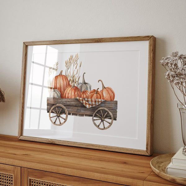 Autumn pumpkin art in wood frame place on wood cabinet