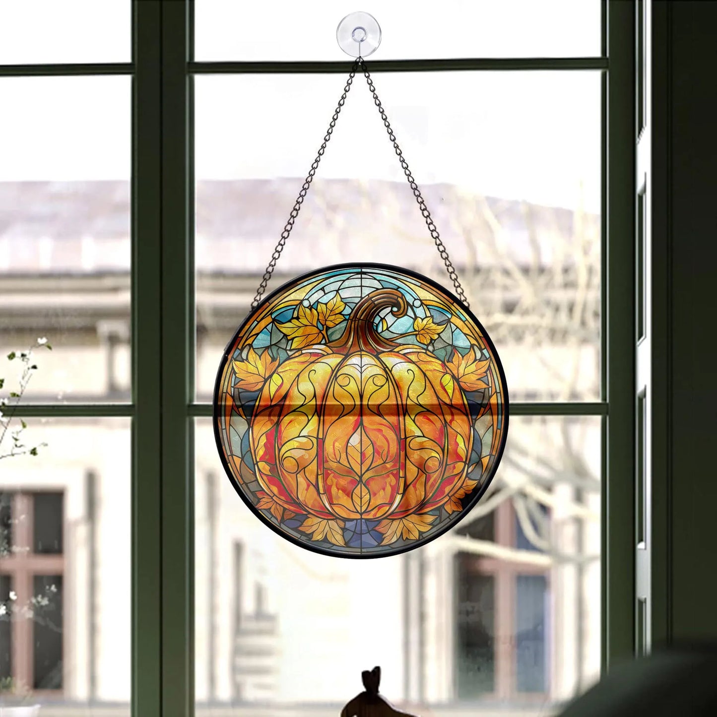 window decoration with pumpkin glass ornament