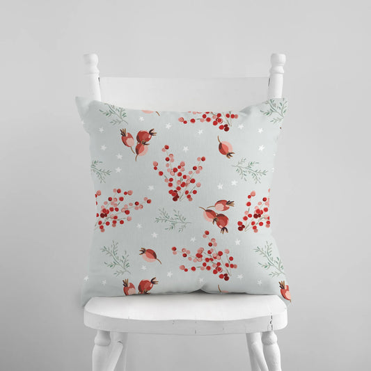 white chair with red berry white pillow from Blue Water Songs