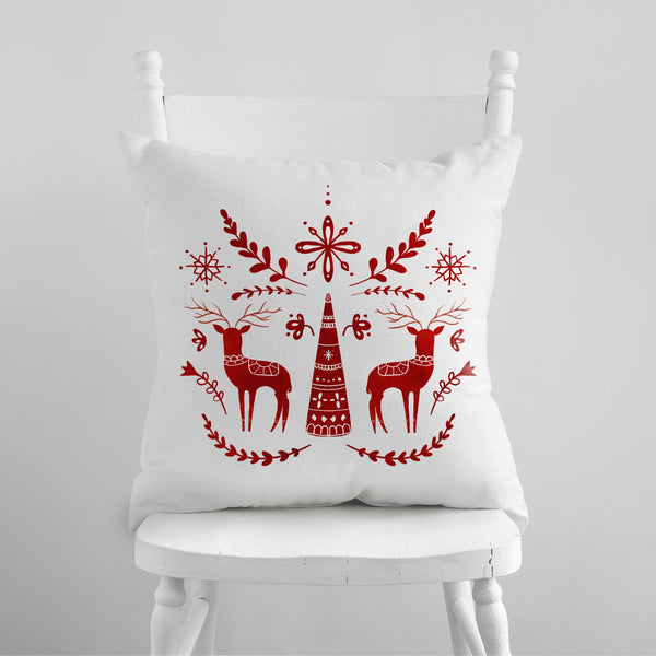 Red Deer Nordic Christmas PILLOW from Blue Water Songs sitting on white chair