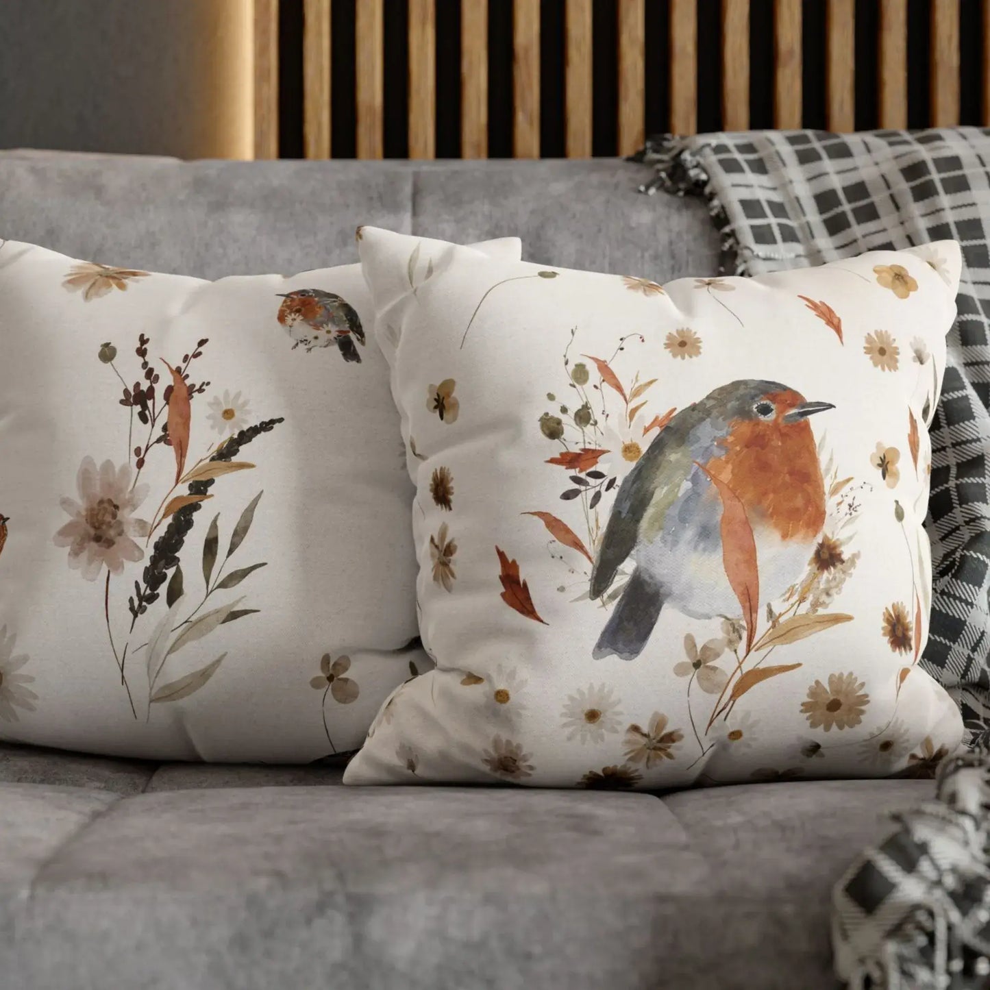 Robin bird fall pillow covers  front and back with fall wildflowers – botanical autumn cushions styled on sofa