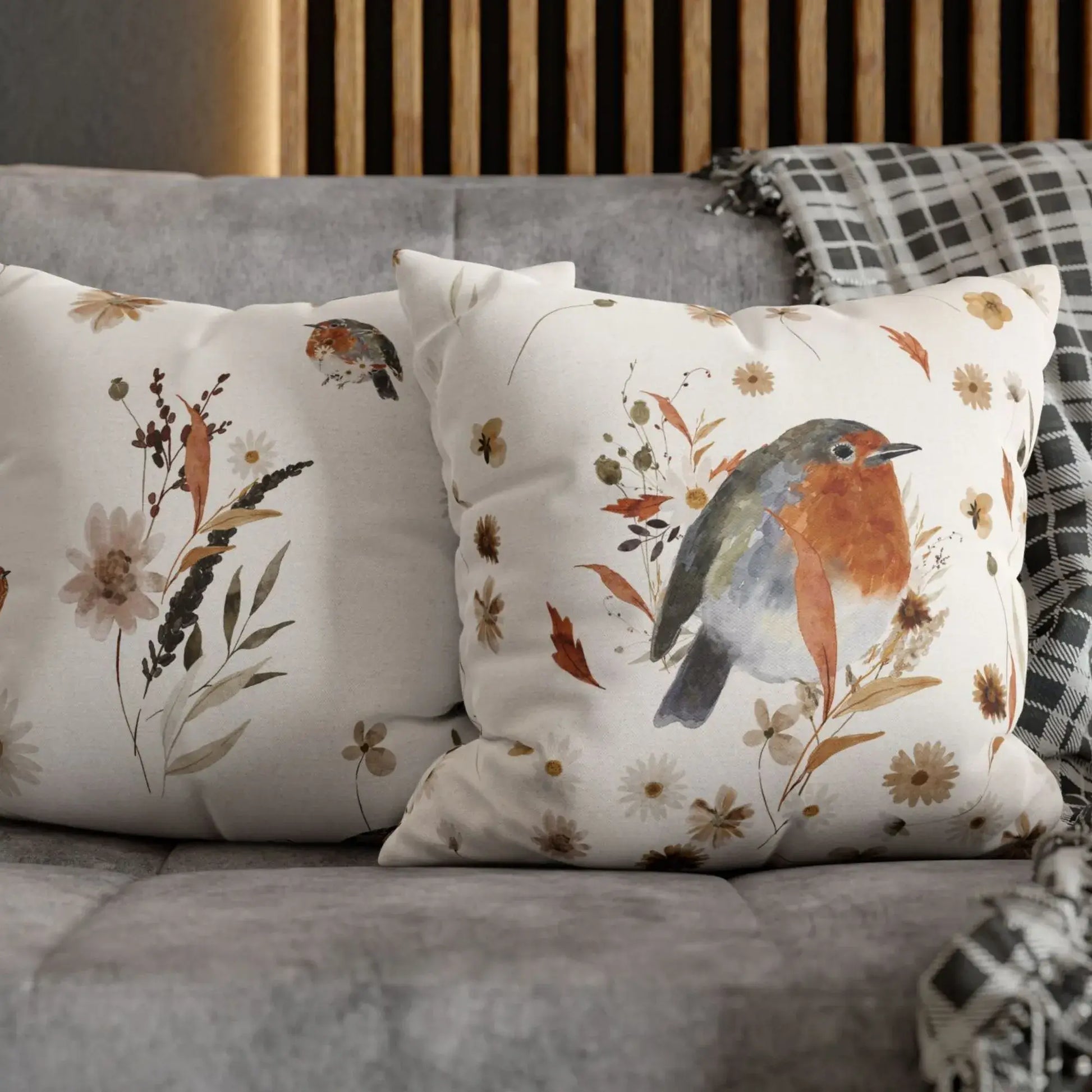 Robin bird fall pillow covers  front and back with fall wildflowers – botanical autumn cushions styled on sofa