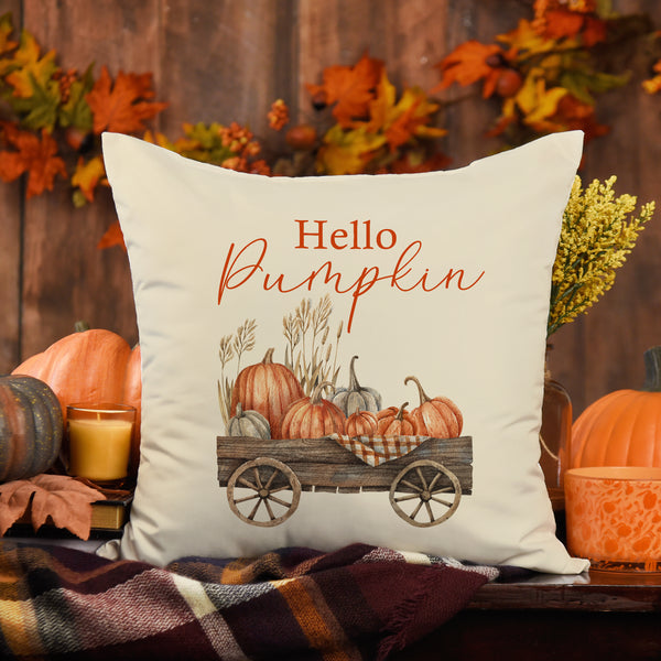 autumn farmhouse decoration with throw pillows and pumpkins around