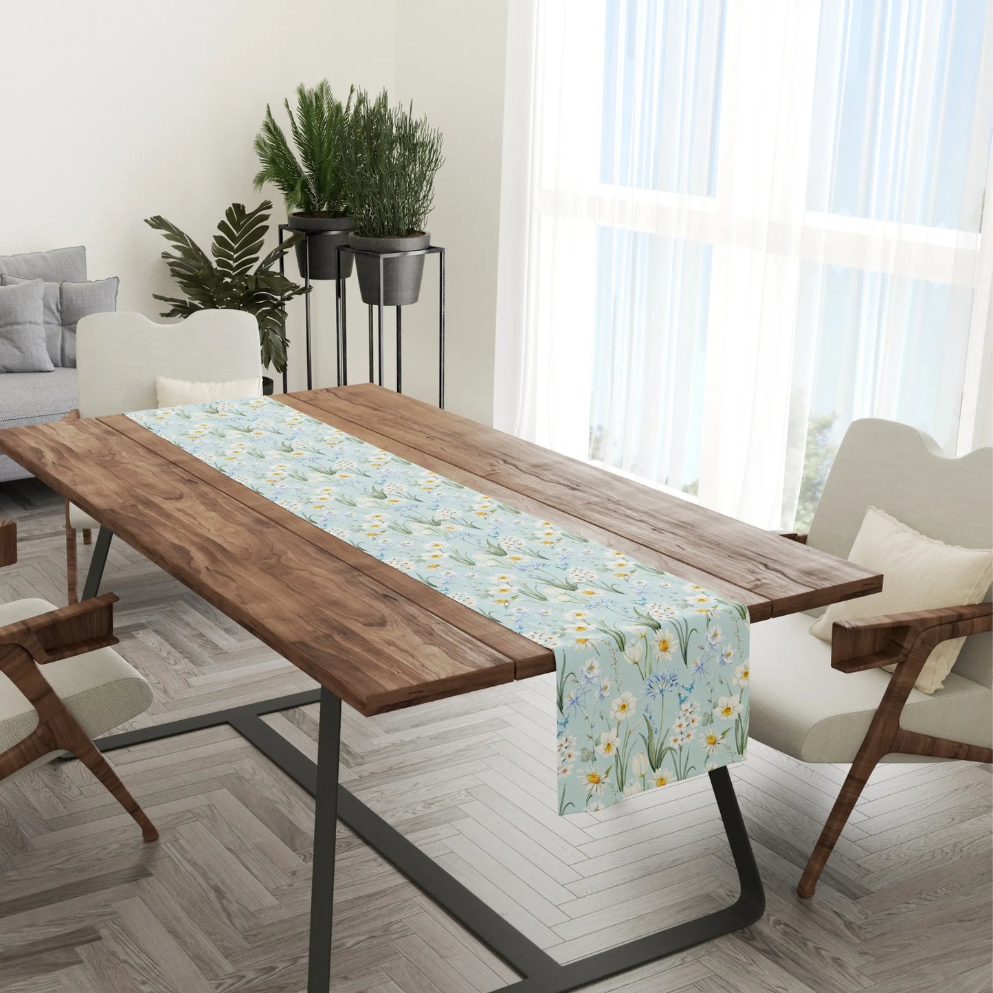 Spring Meadow Table Runner spread across a wooden dining table, featuring delicate watercolor flowers in soft colors.