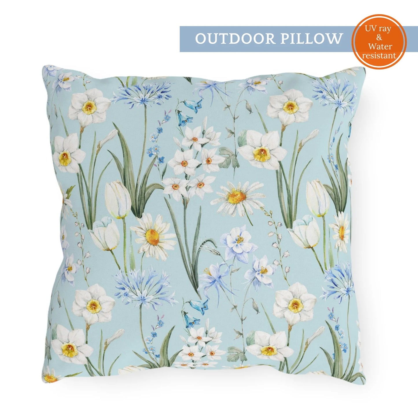 Square outdoor pillow with watercolor white daffodils, daisies, and blue florals on a soft sky blue background – UV and water-resistant design