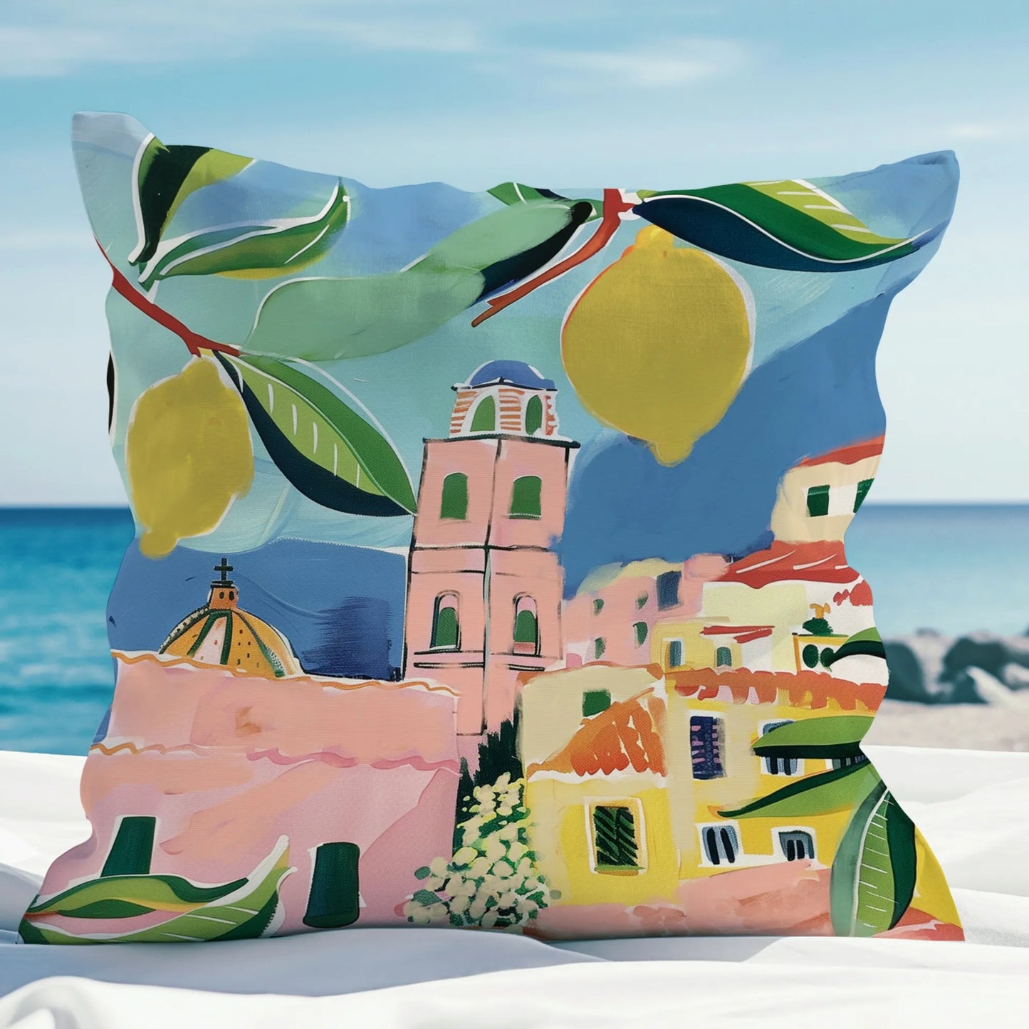 Summer citrus pillow styled in coastal outdoor space