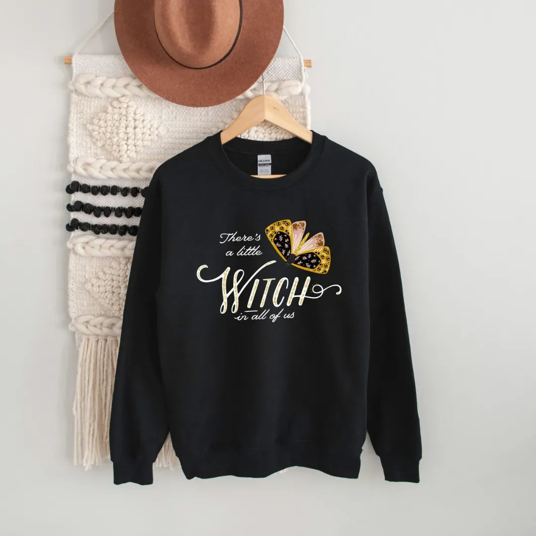 Moth Witch SWEATSHIRTS from Blue Water Songs hanging on the wall