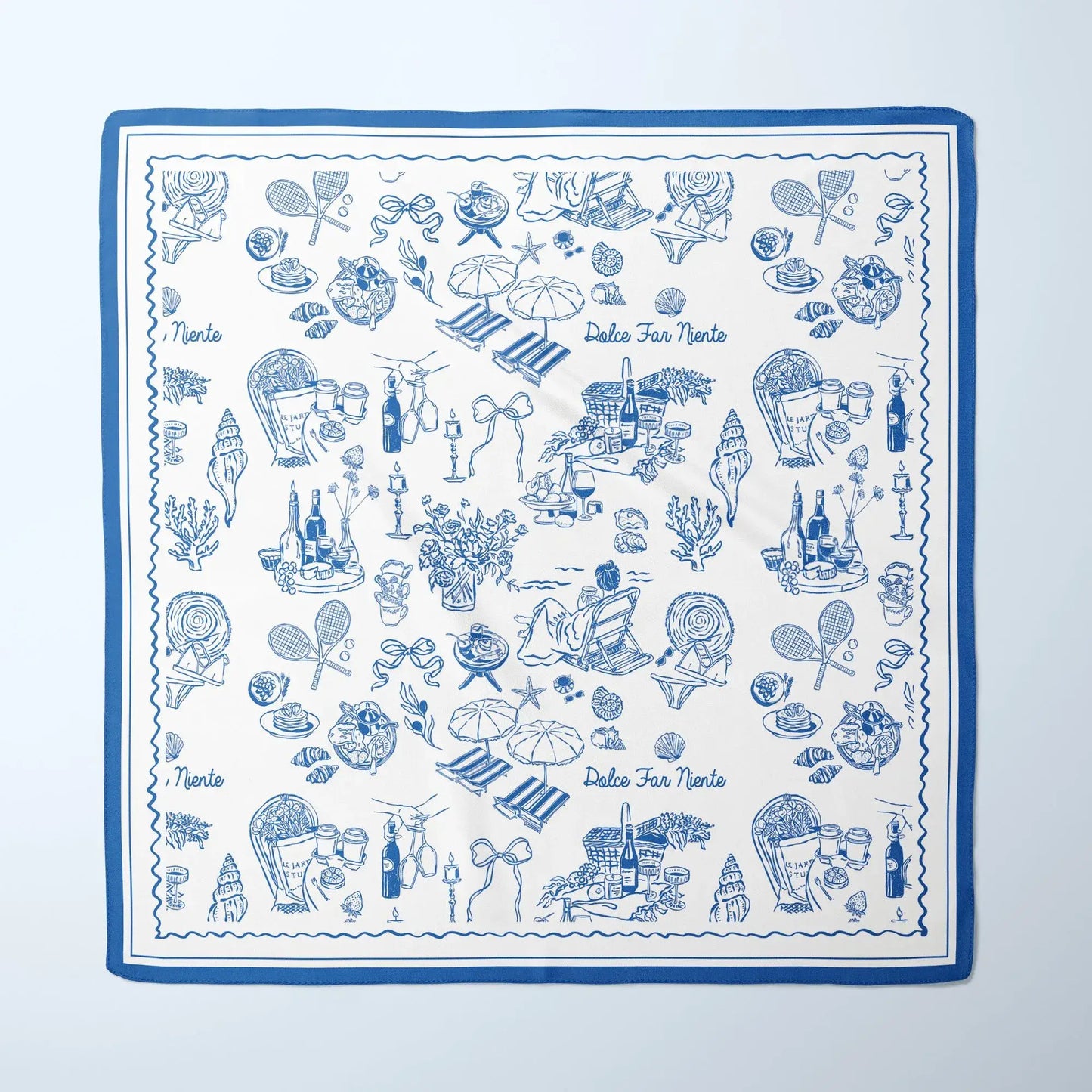 The Dolce Moment Silk Scarf in blue and white with Italian summer illustrations and “Dolce Far Niente” text in vintage line art style.