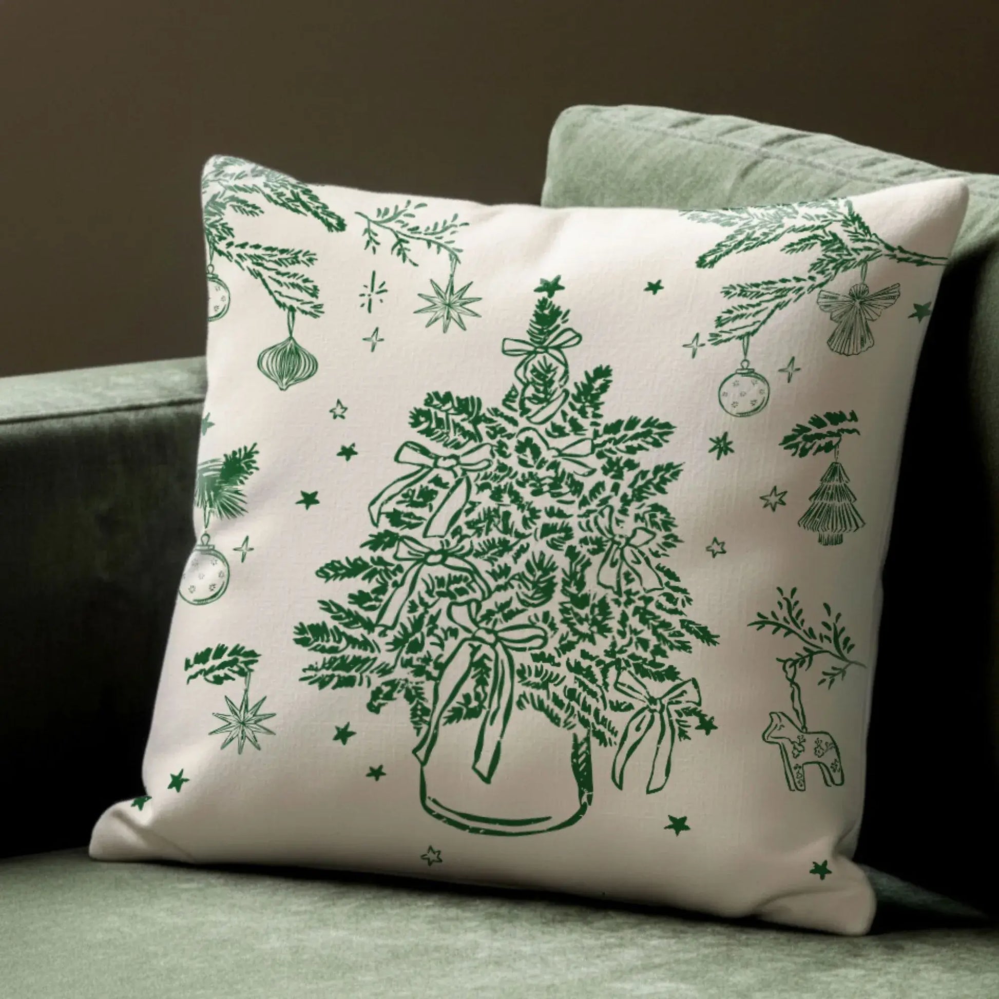 Vintage Christmas tree pillow cover with green botanical design on sofa