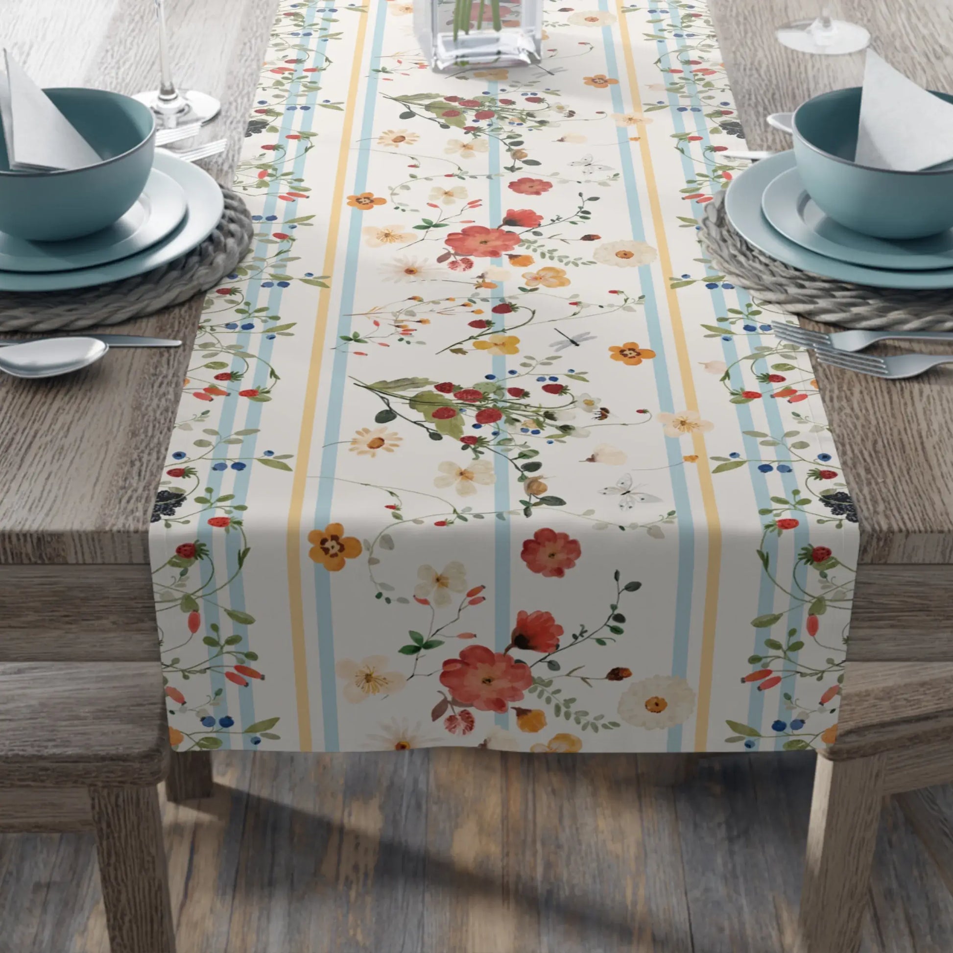 Watercolor Berry Botanical TABLE RUNNER on a wooden table with blue dinnerware and floral designs.