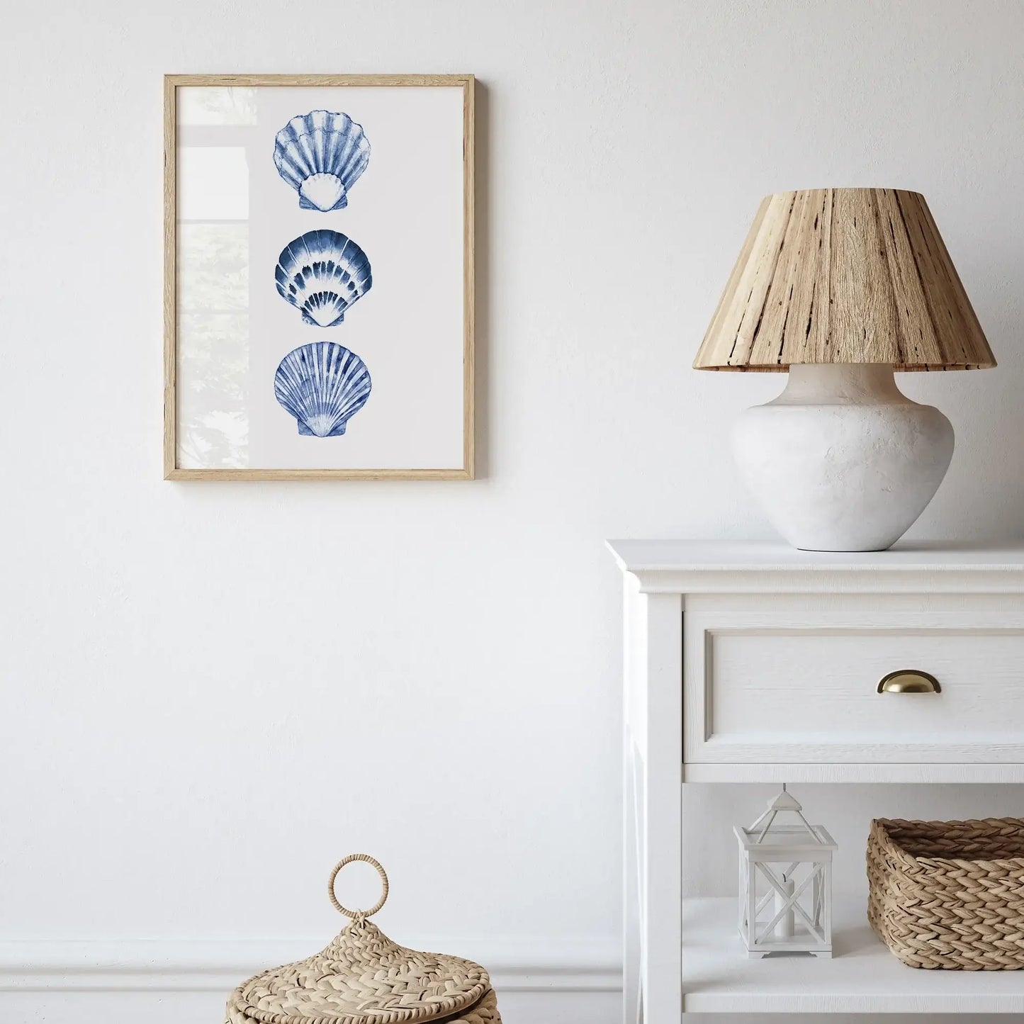 Watercolor blue seashells art print framed and styled in coastal farmhouse room, neutral decor with white table and natural textures, digital download.