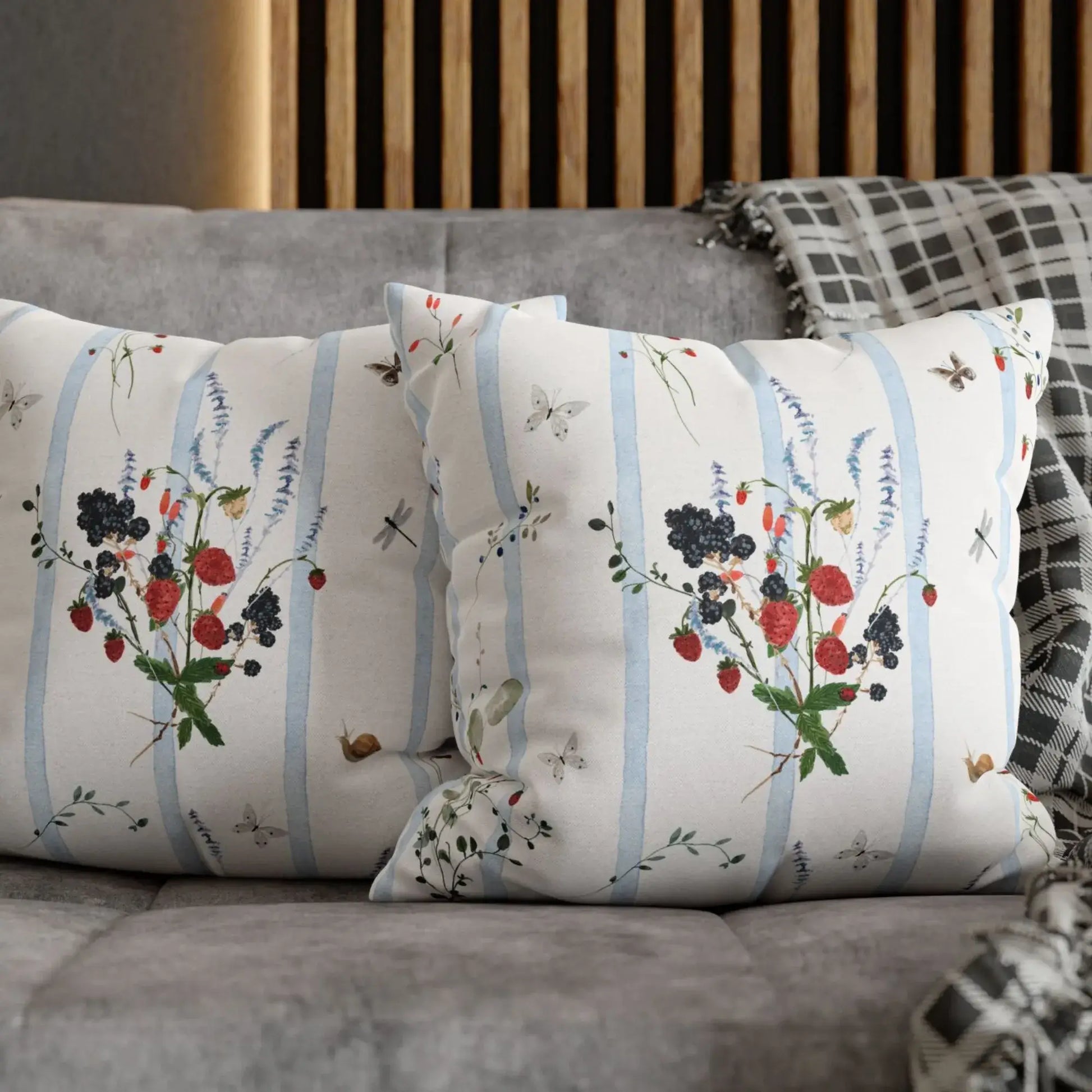 Watercolor Berry Botanical Pillow design with watercolor strawberries and blackberries on soft blue stripes.