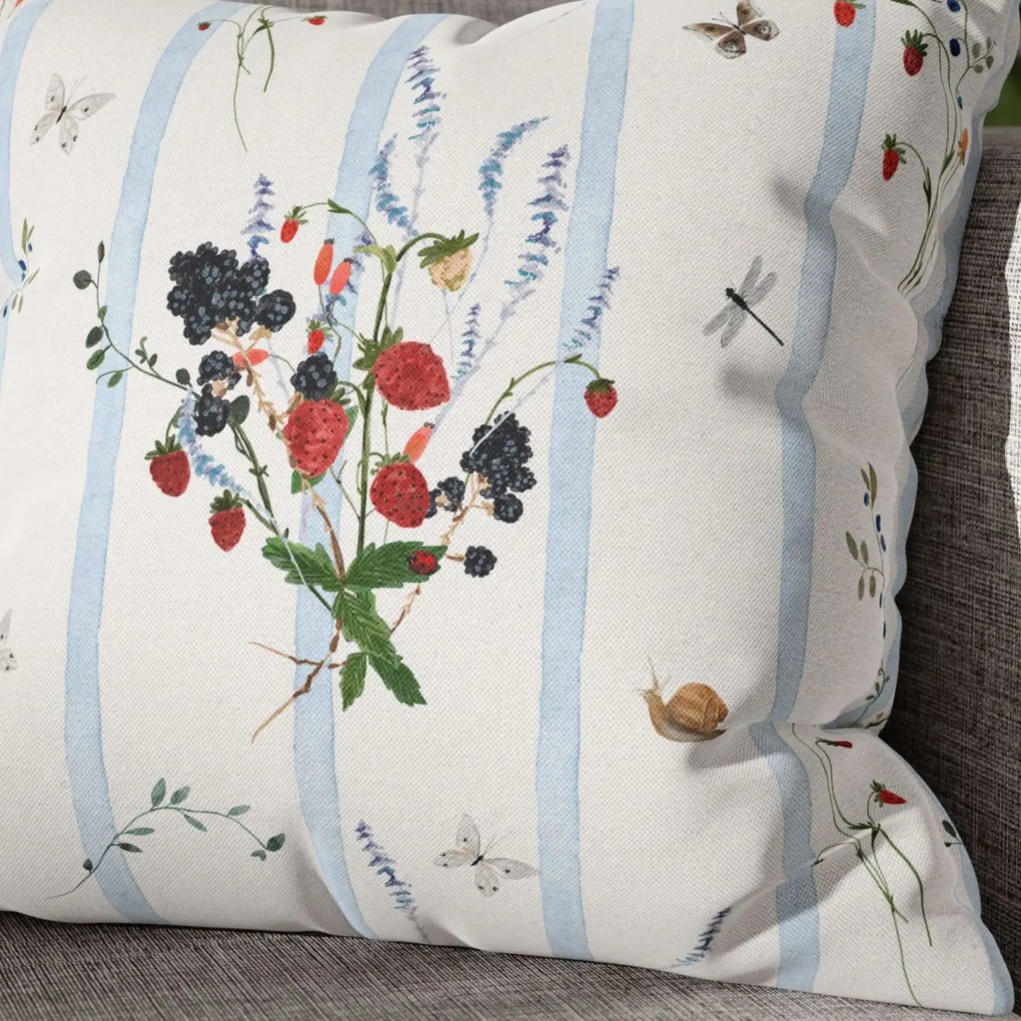 Watercolor Berry Botanical Pillow featuring watercolor strawberries and blackberries on soft blue striped background.