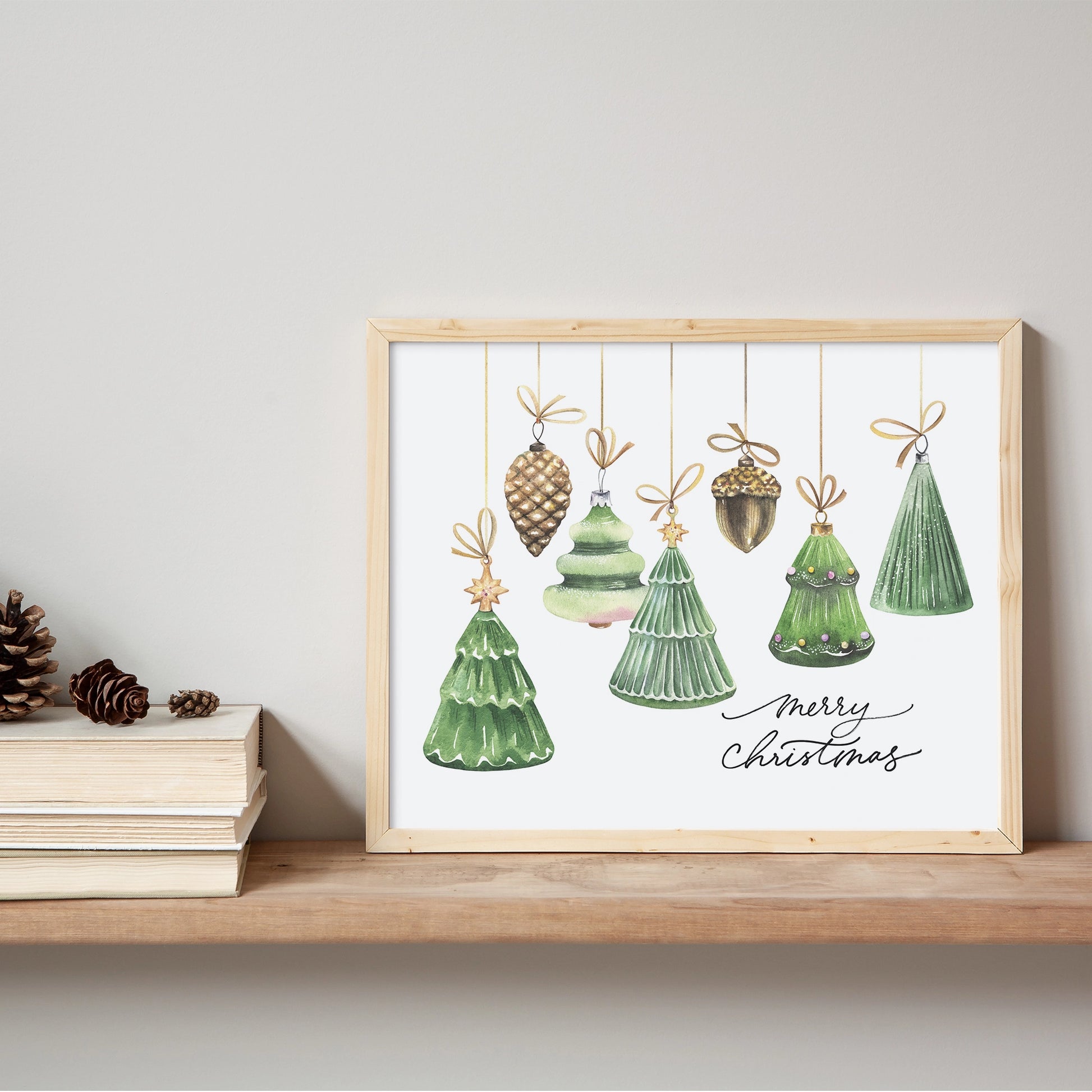 Blue Water Songs's Watercolor Christmas Ornaments Art print next to book pile