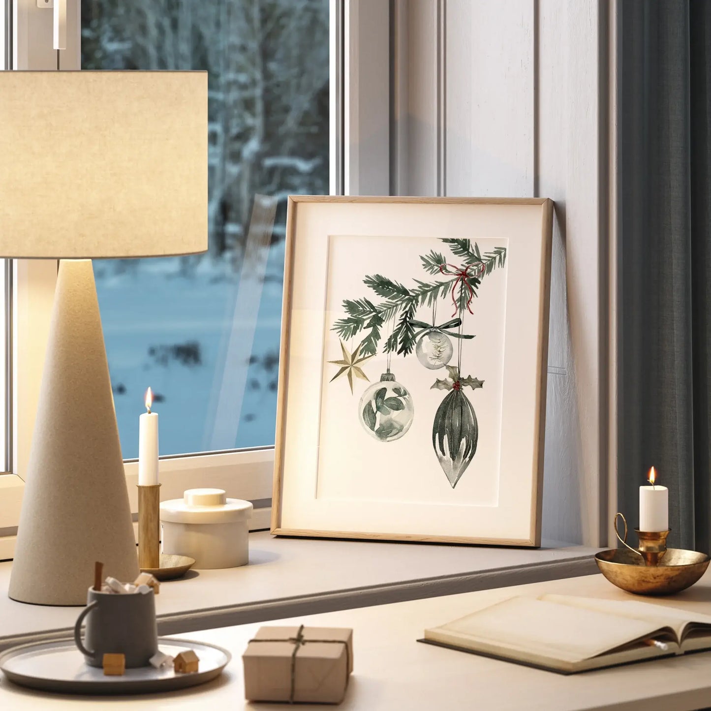 Christmas Ornaments Print Art displayed on a windowsill, surrounded by cozy decor and winter scenery.