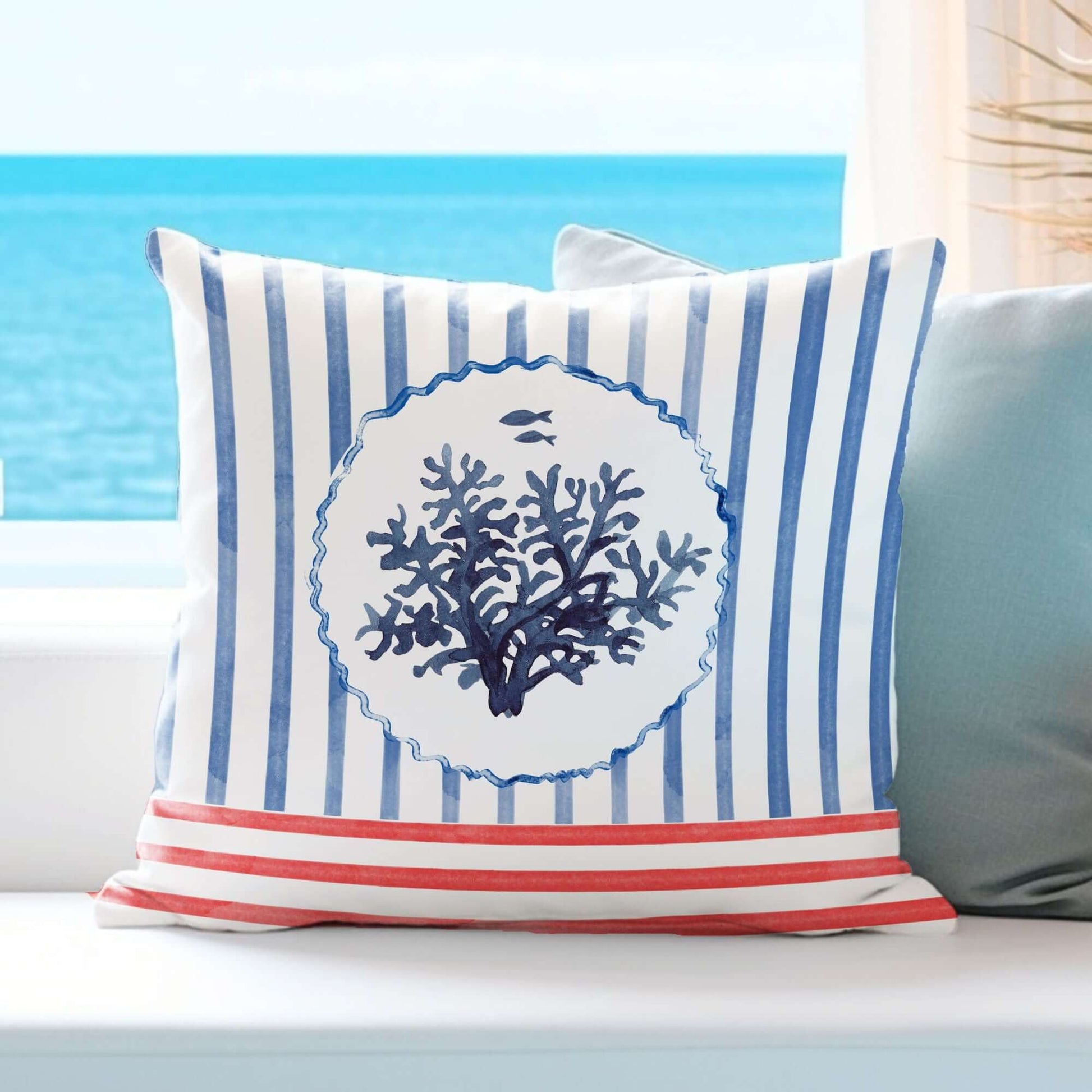 Watercolor Coral and Coastal Stripes Pillow and Cover featuring blue coral design and coastal stripes.