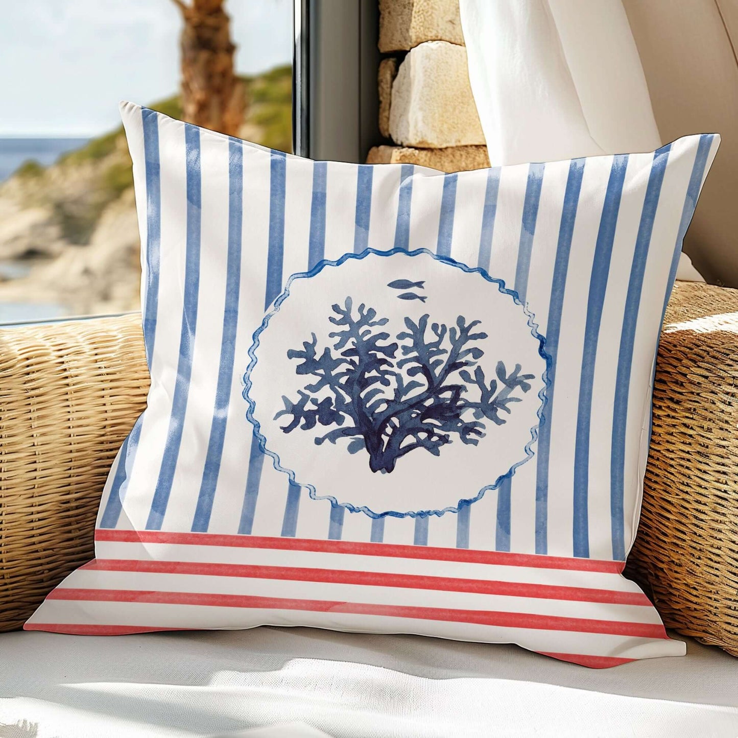 Watercolor Coral and Coastal Stripes Pillow and Cover with blue coral and striped pattern on a cozy chair.
