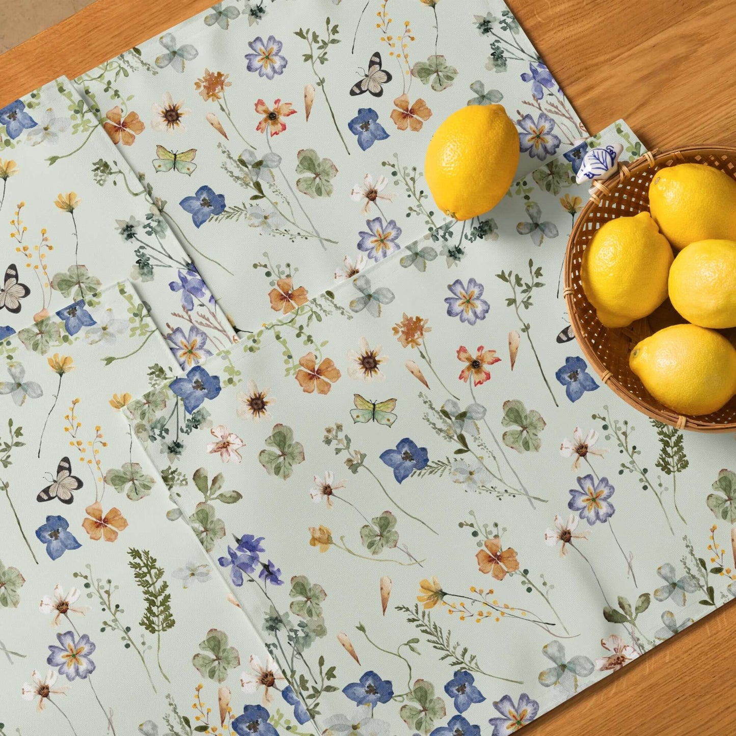 Wildflowers Floral PLACEMAT - green Tone from BLUE WATER SONGS with lemons next to it