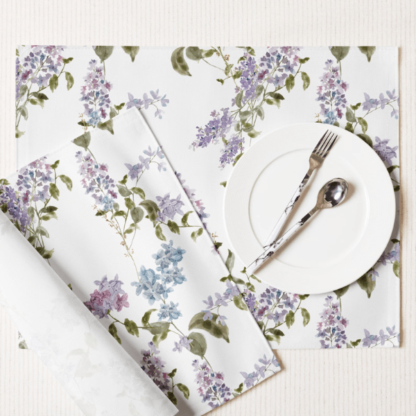 Watercolor Lilac Flower PLACEMAT Set featuring soft lavender and blue floral designs on a stylish table setting.