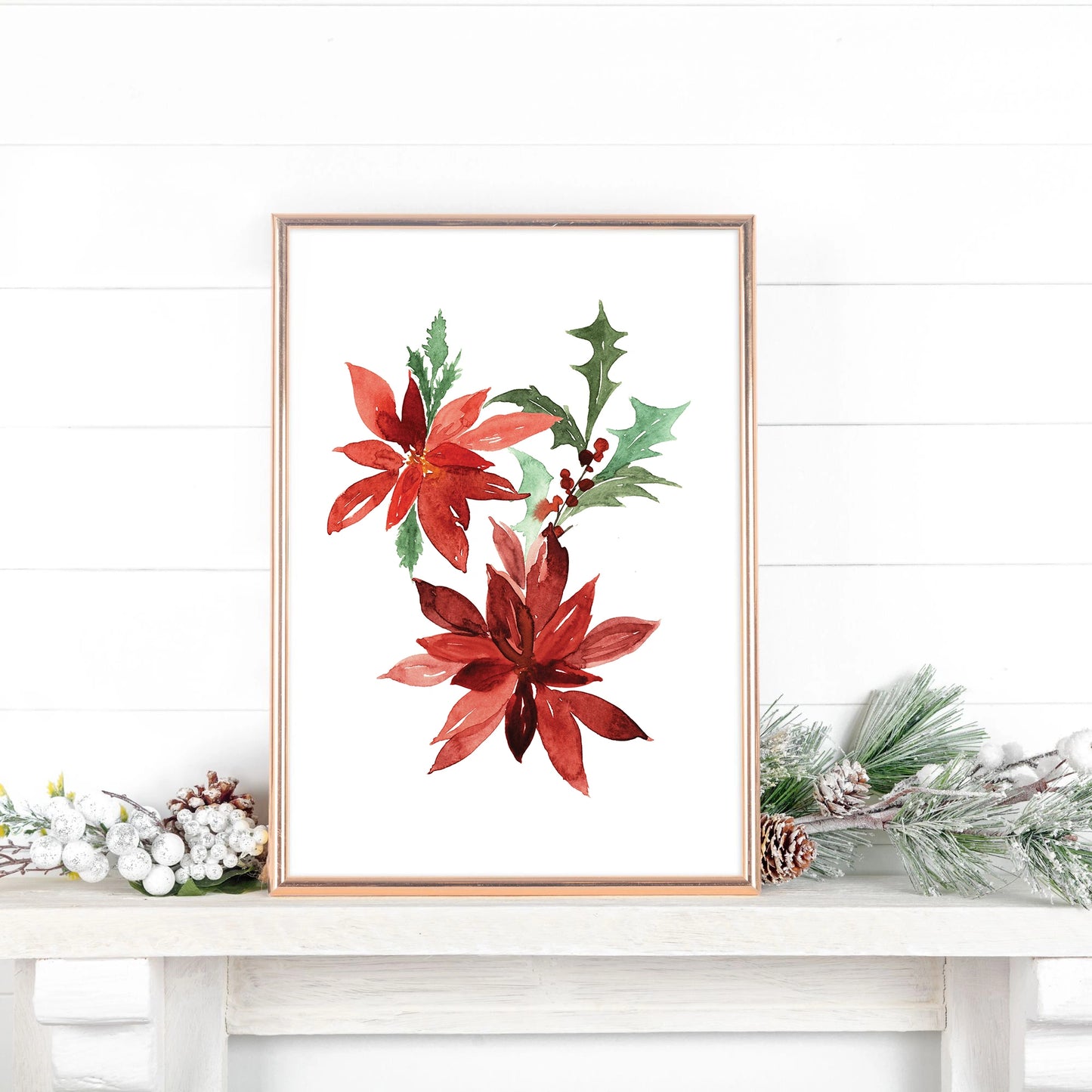 Poinsettia Christmas Art print featuring watercolor poinsettias and greenery in a wooden frame.