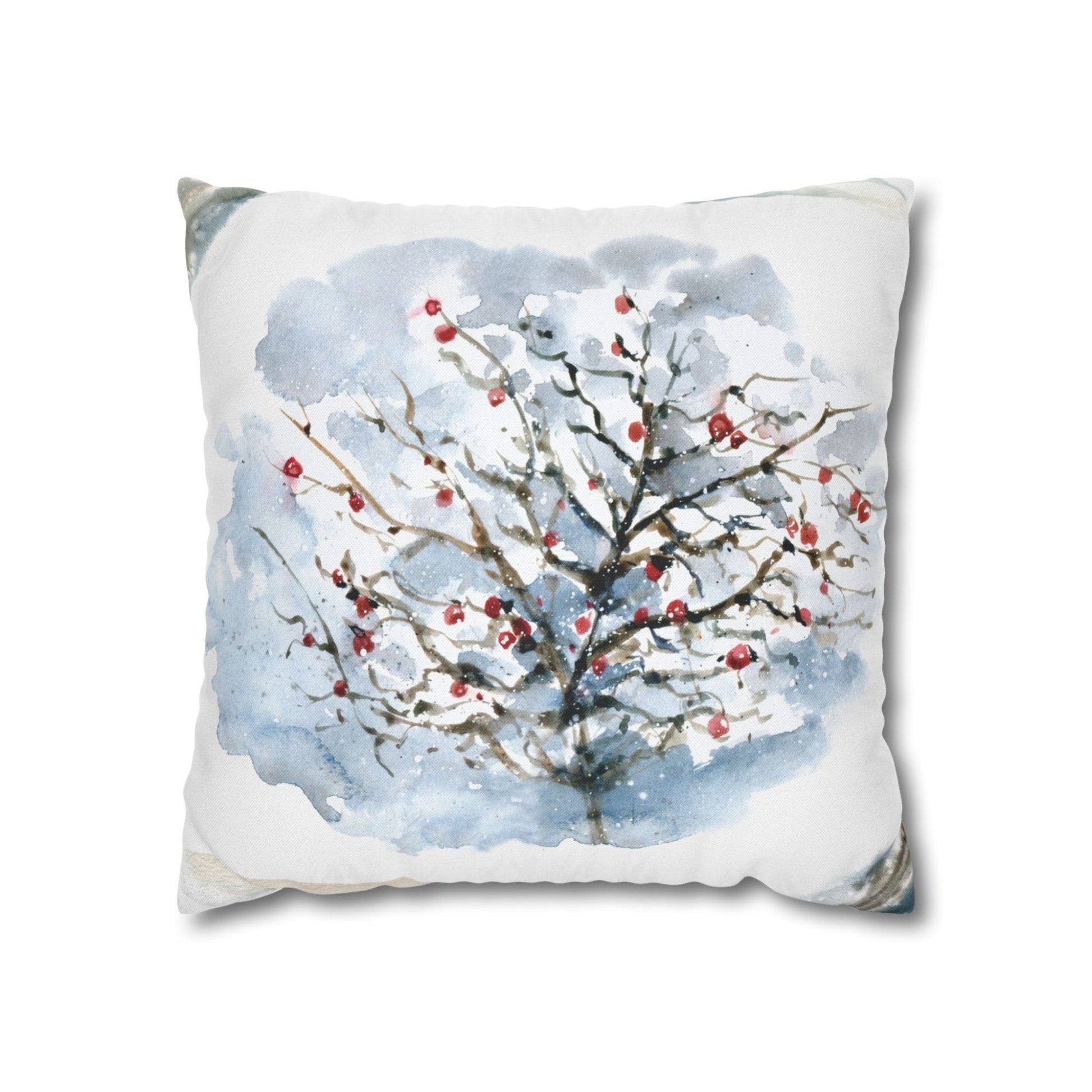 Watercolor winter pillow with red berries and snowy tree – soft seasonal decor with nature-inspired style