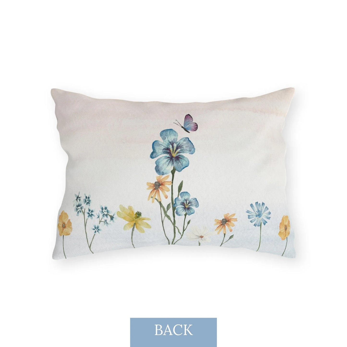 Back of outdoor pillow featuring soft pastel wildflowers and a delicate butterfly, ideal for botanical and seasonal patio decor.