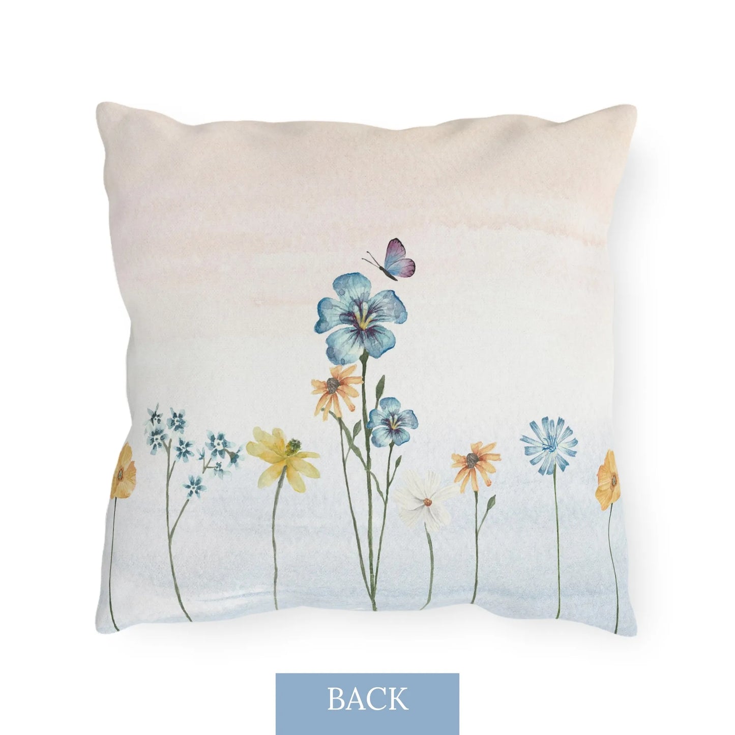Back side of outdoor pillow featuring watercolor wildflowers and a butterfly on a soft beige background, ideal for botanical and seasonal decor.