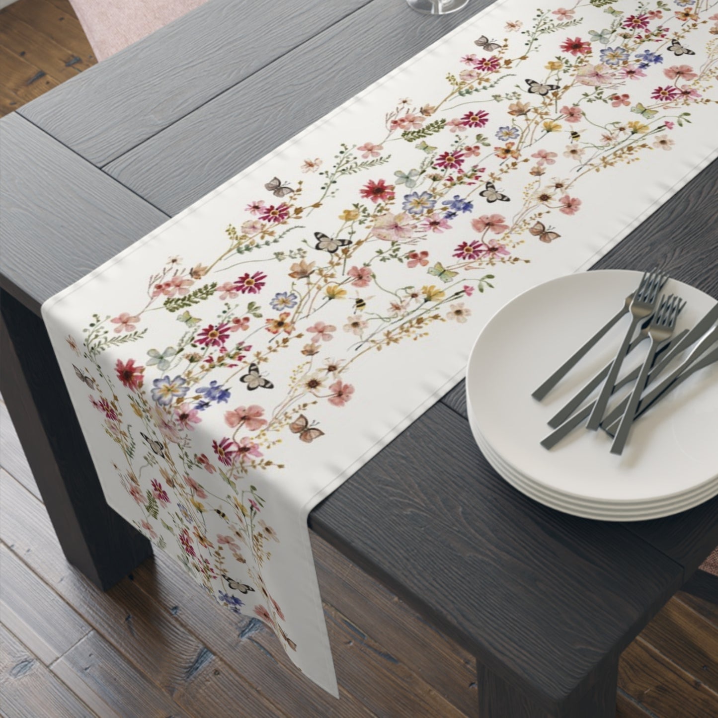 black wood table with Watercolor Pressed & Dried Wildflowers TABLE RUNNER from Blue Water Songs on it