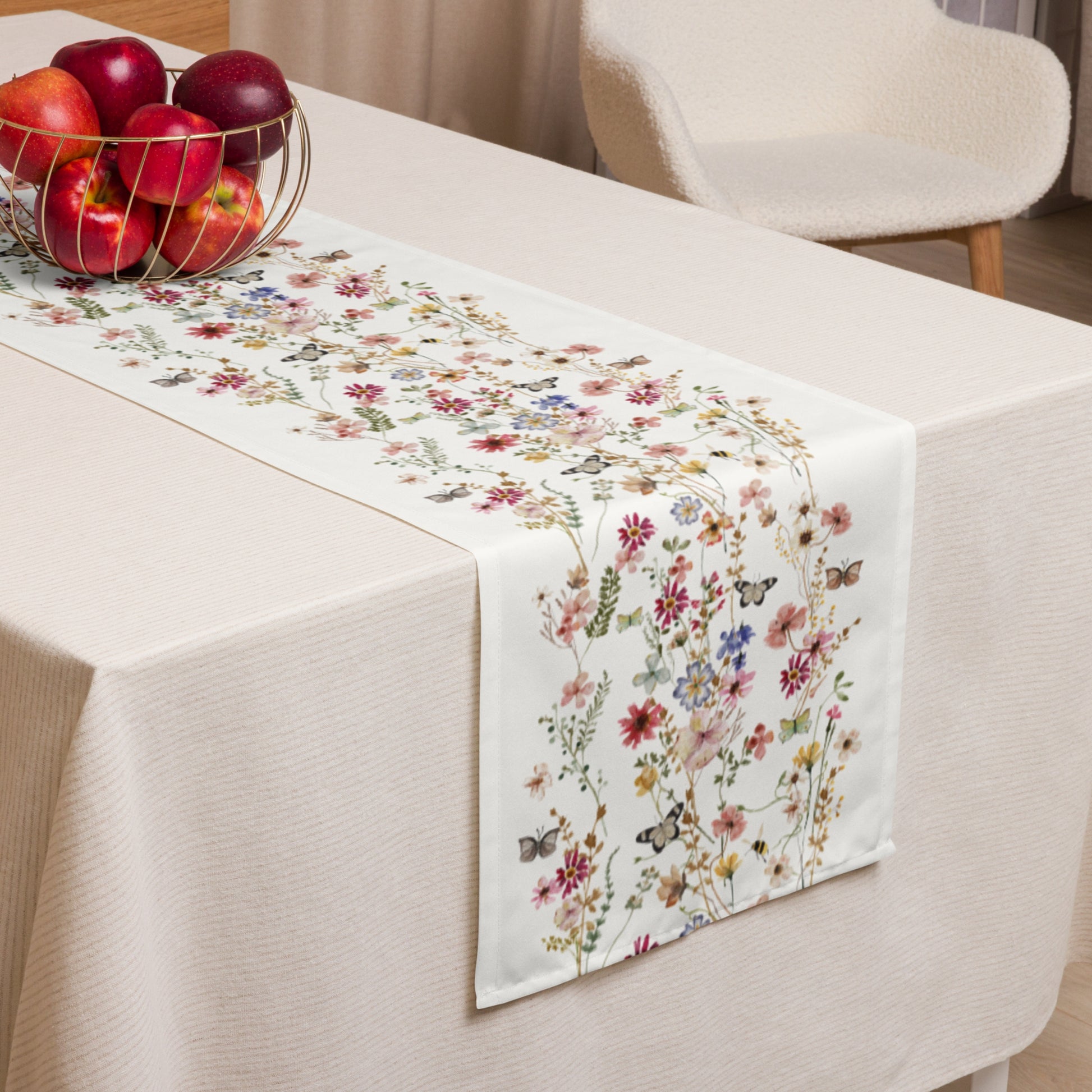 table is covered with cream cloth and Watercolor Pressed & Dried Wildflowers TABLE RUNNER from Blue Water Songs