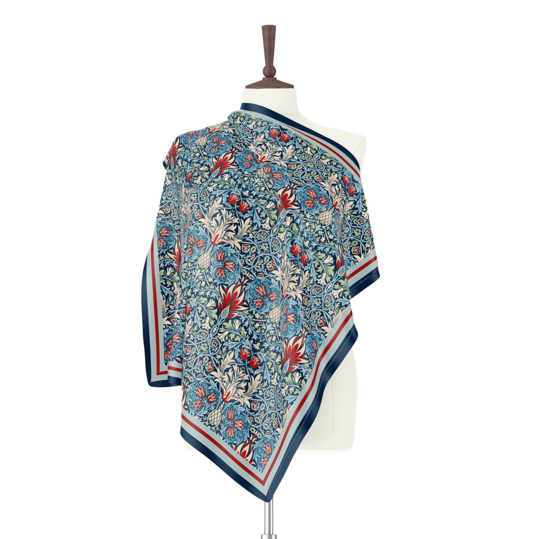 William Morris Scarf Snakehead featuring a vintage floral pattern with fritillary flowers and a blue background.