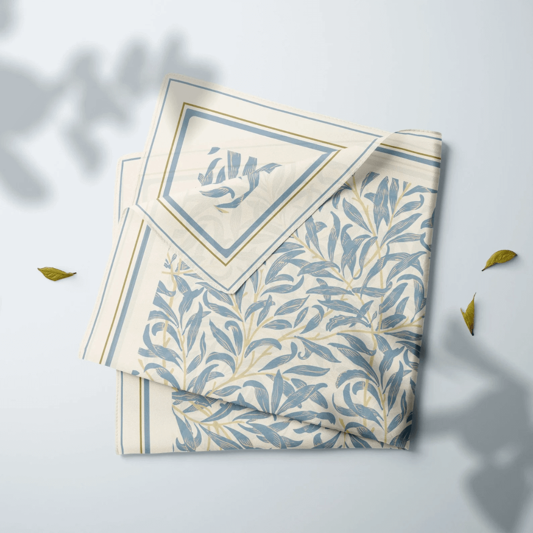 William Morris Silk Scarf Blue Willow Boughs featuring delicate blue floral designs on cream fabric.