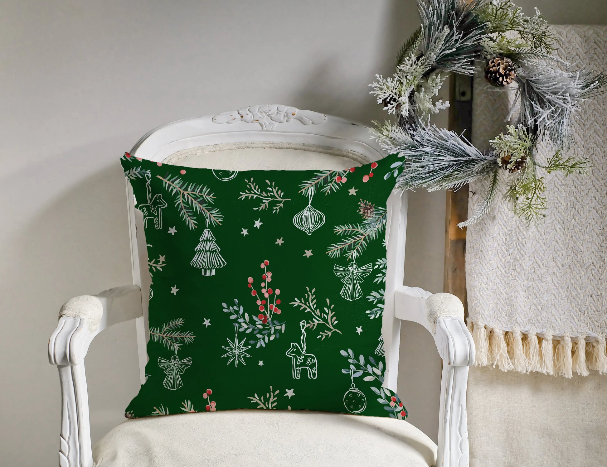 Winter berry Christmas pillow cover featuring festive designs on a green background, perfect Scandinavian holiday decor.