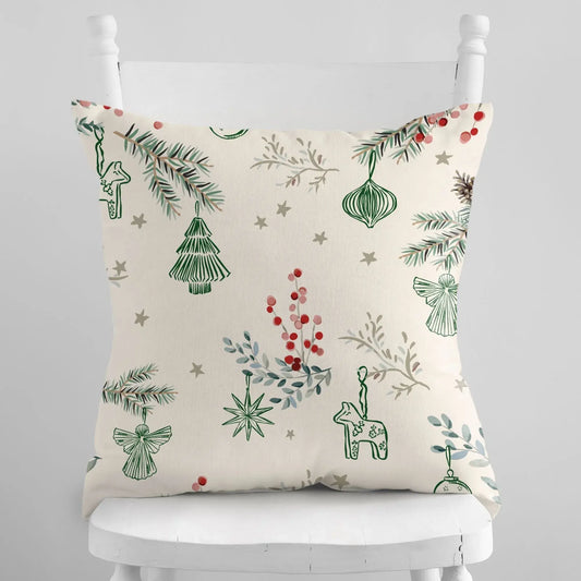 Winter berry Christmas pillow cover featuring festive patterns of berries, pine branches, and ornaments on a beige background.