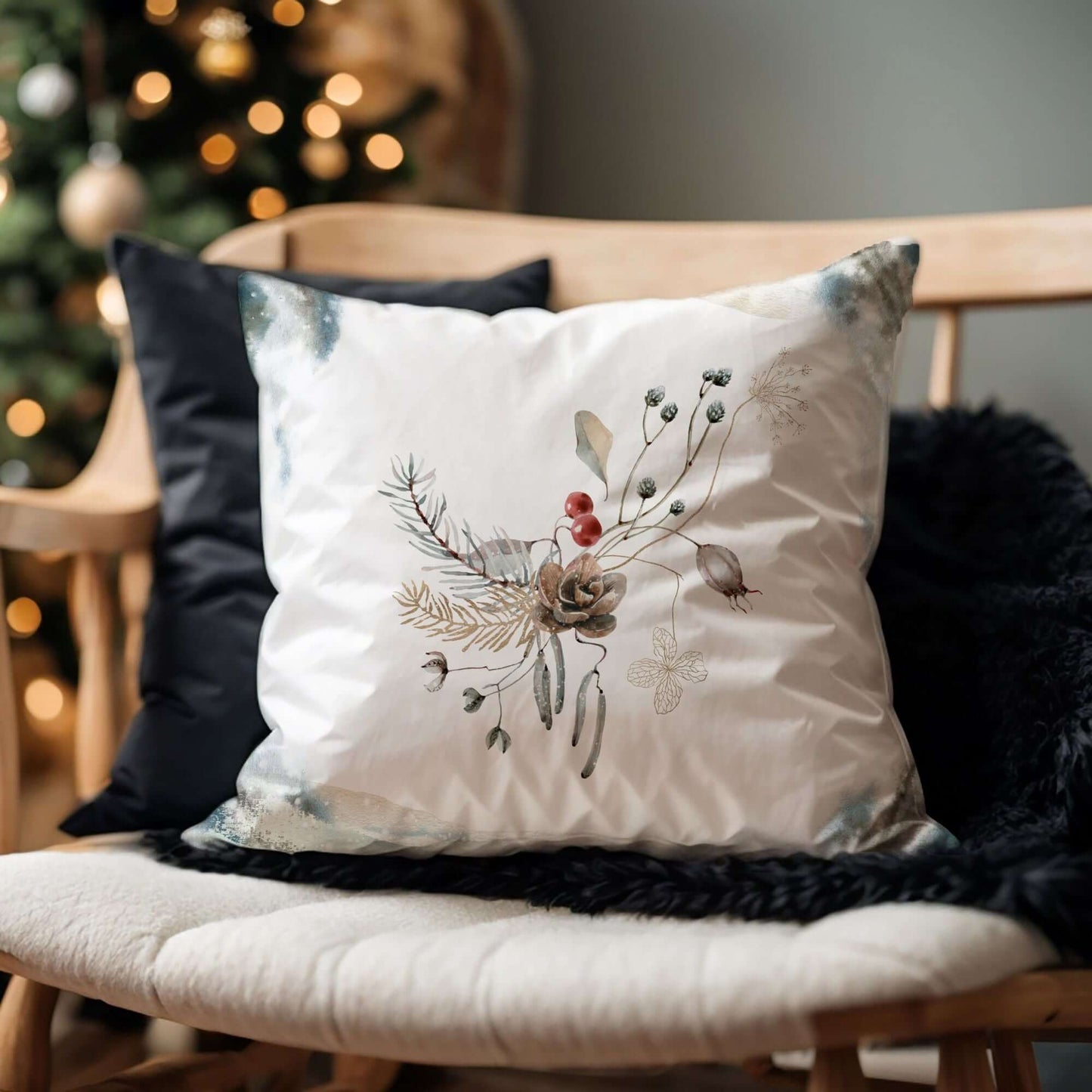 Winter Botanical Pillow Cover featuring hand-painted winter elements on a cozy chair.