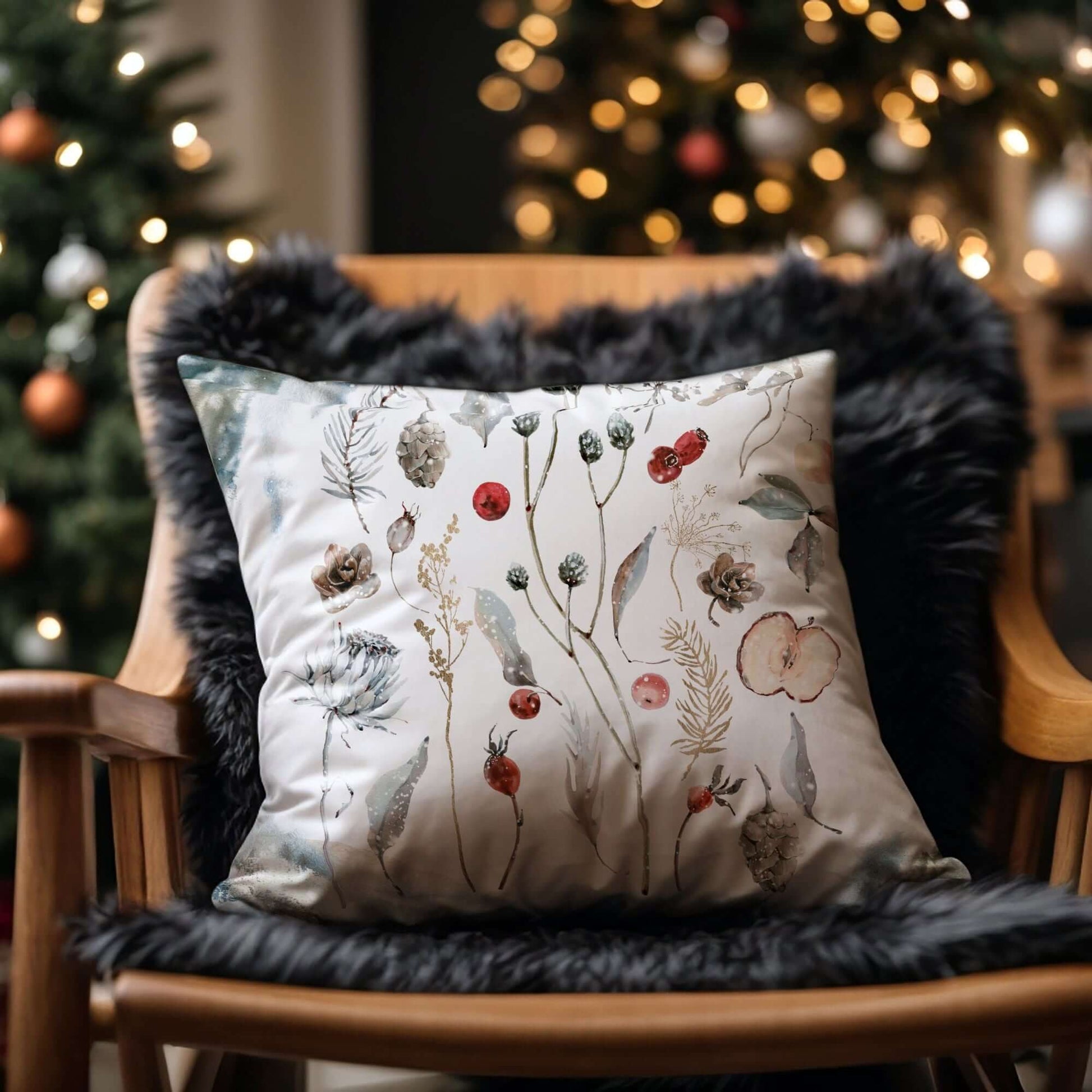 Winter Botanical Pillow Cover featuring hand-painted winter elements on a cozy chair with holiday decor.