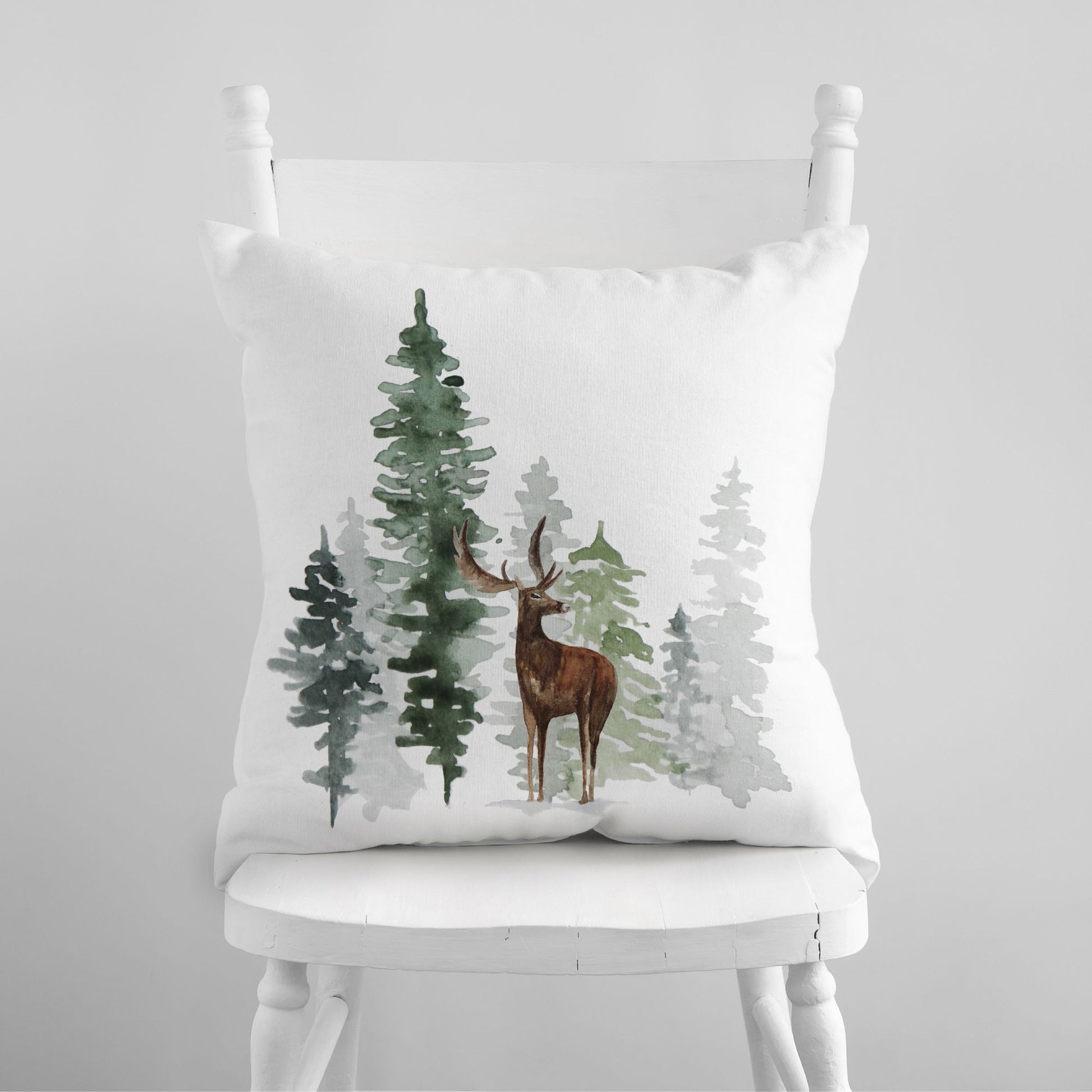 Winter Tree PILLOW from Blue Water Songs sitting on white chair