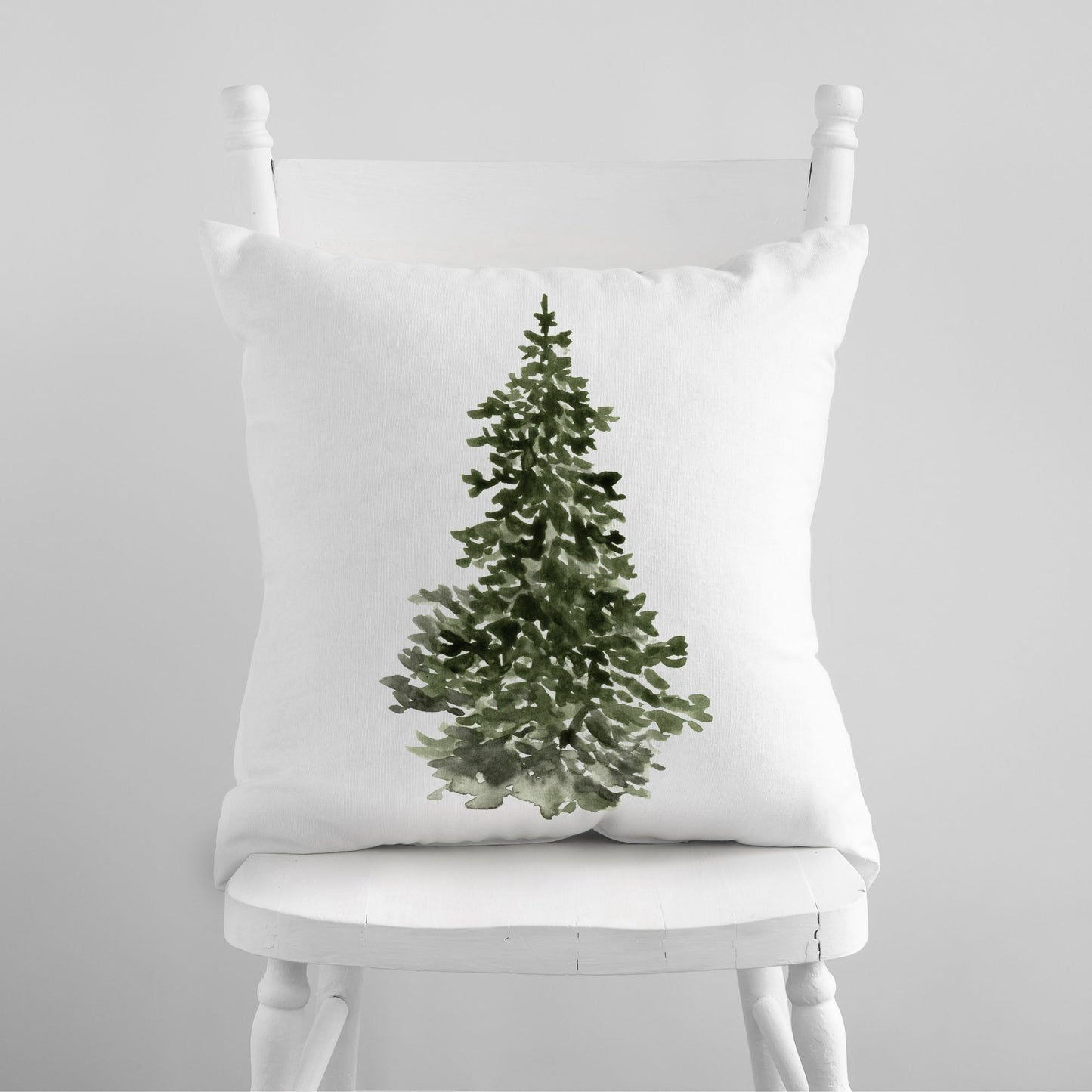 Blue Water Songs christmas tree pillow on white chair