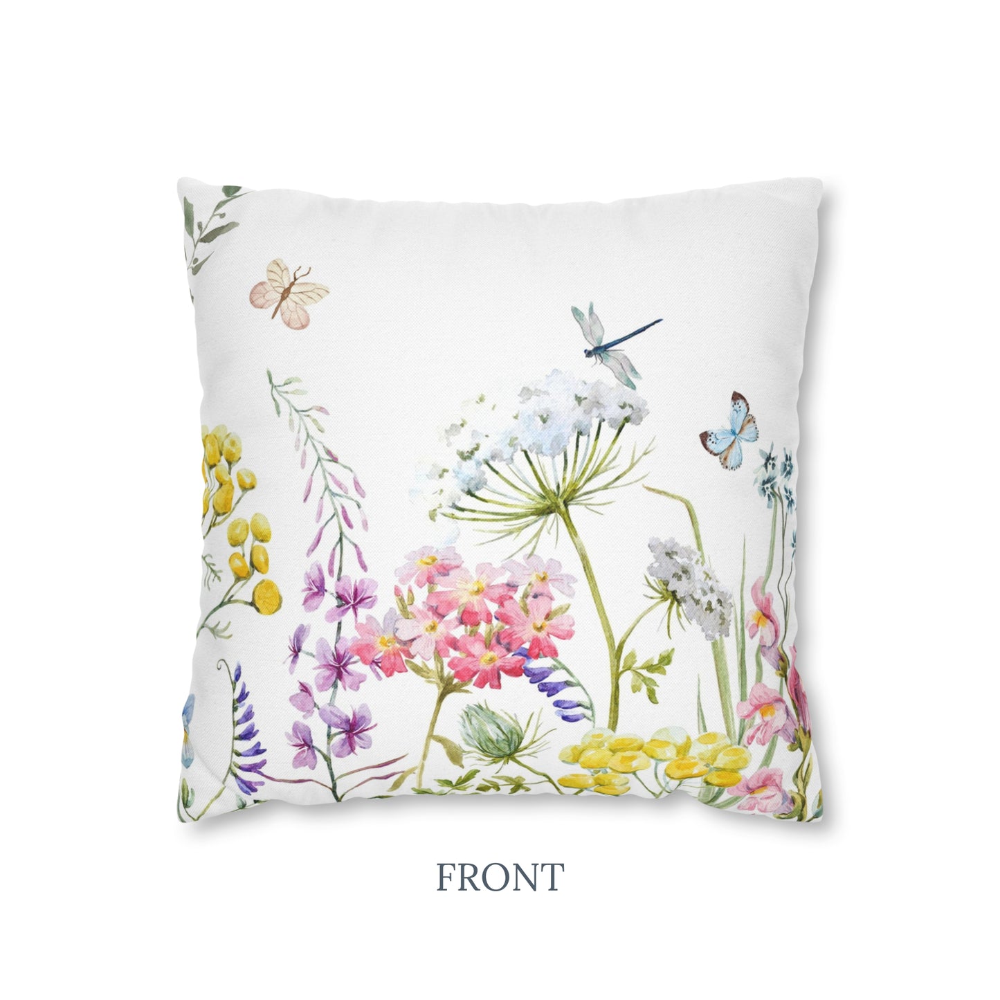 a white pillow with flowers and butterflies on it