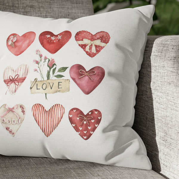 a pillow with a bunch of hearts on it