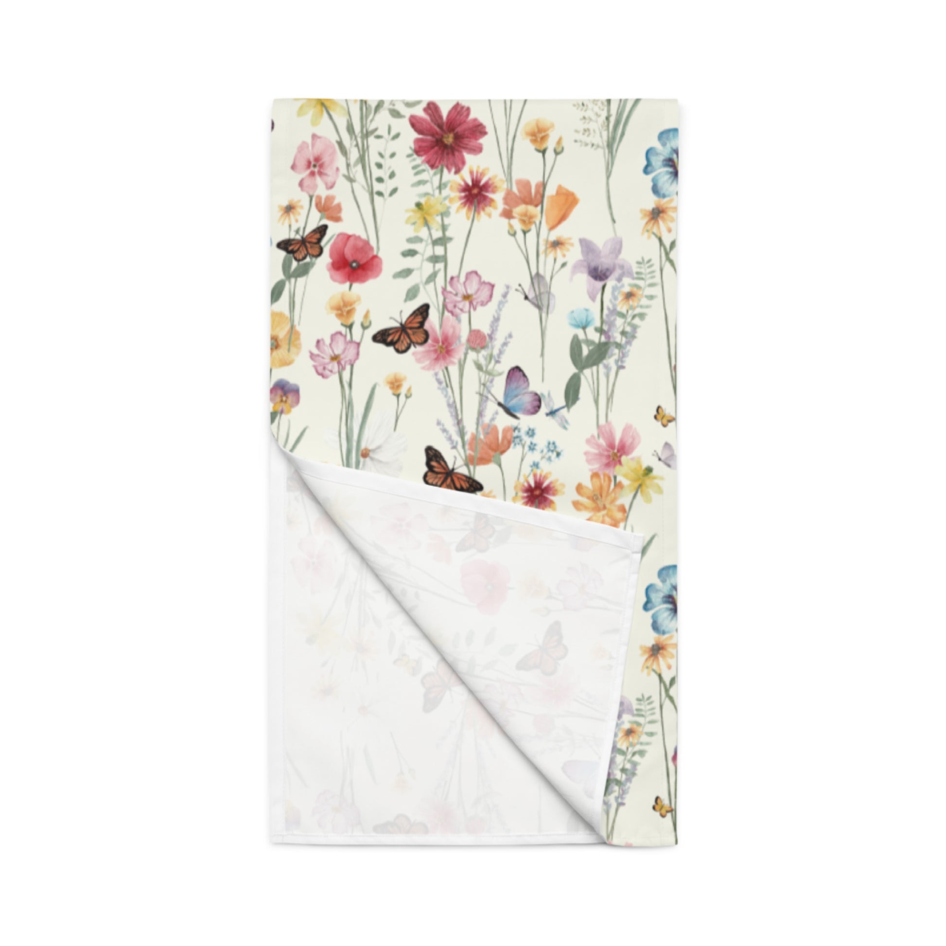 a colorful flower table runner sitting on top of a table