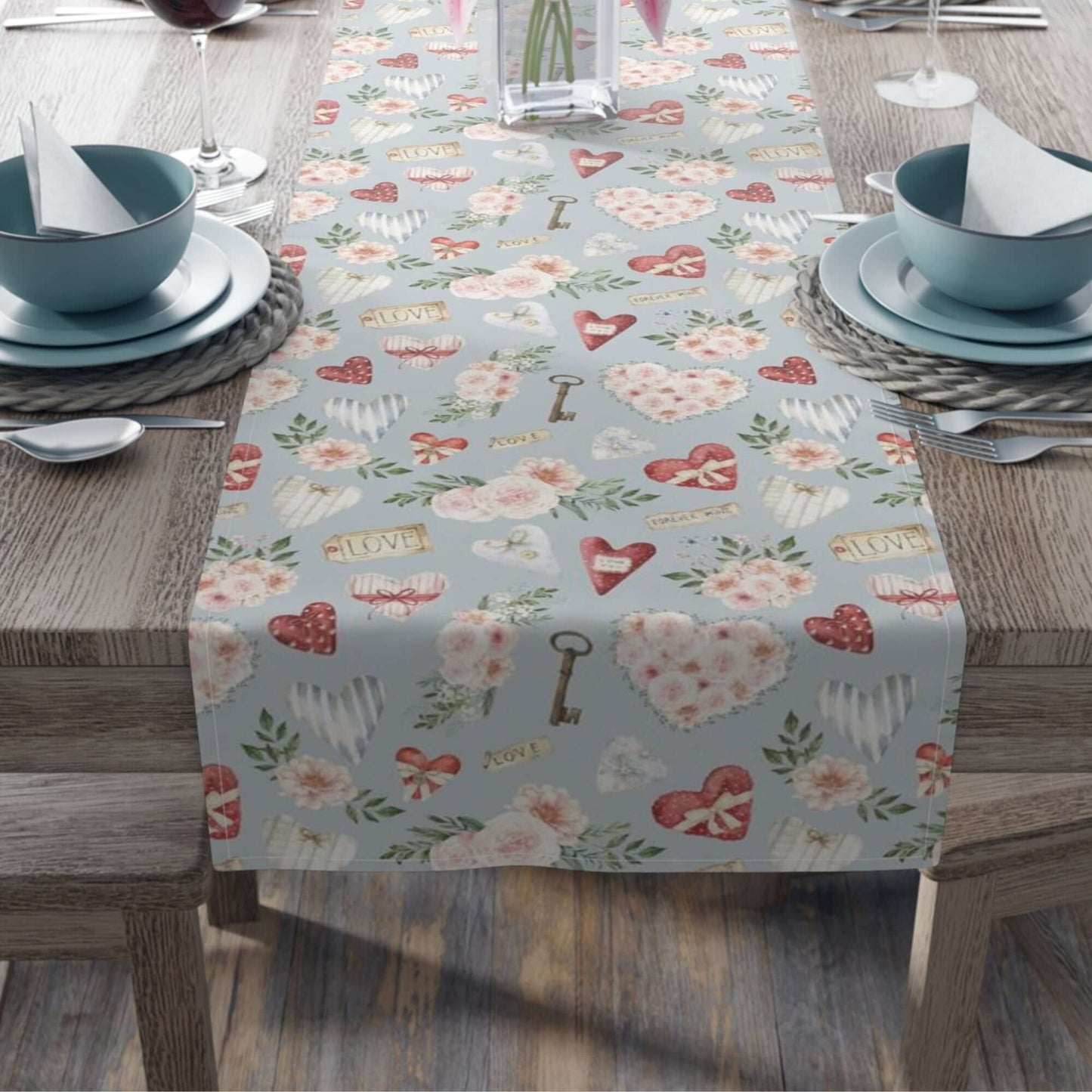 Blue Valentine table runner with watercolor roses and hearts on wooden dining table