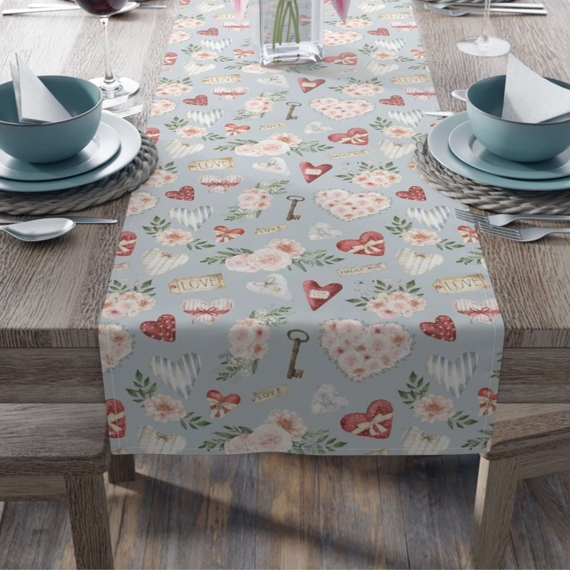 Blue Valentine table runner with watercolor roses and hearts on wooden dining table